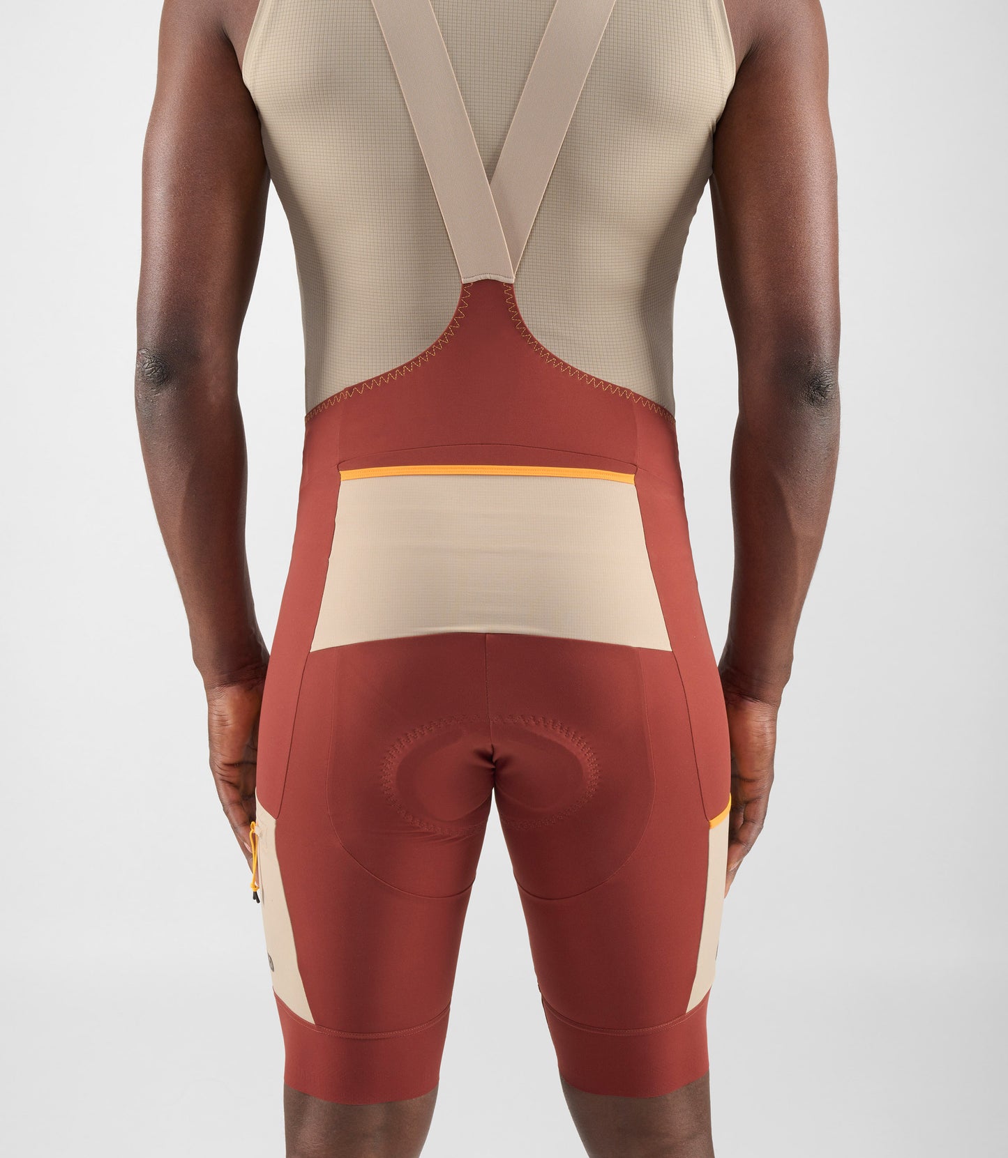 24SBBOD75PE_6_cycling cargo bibshort dark red men odyssey back pocket pedaled