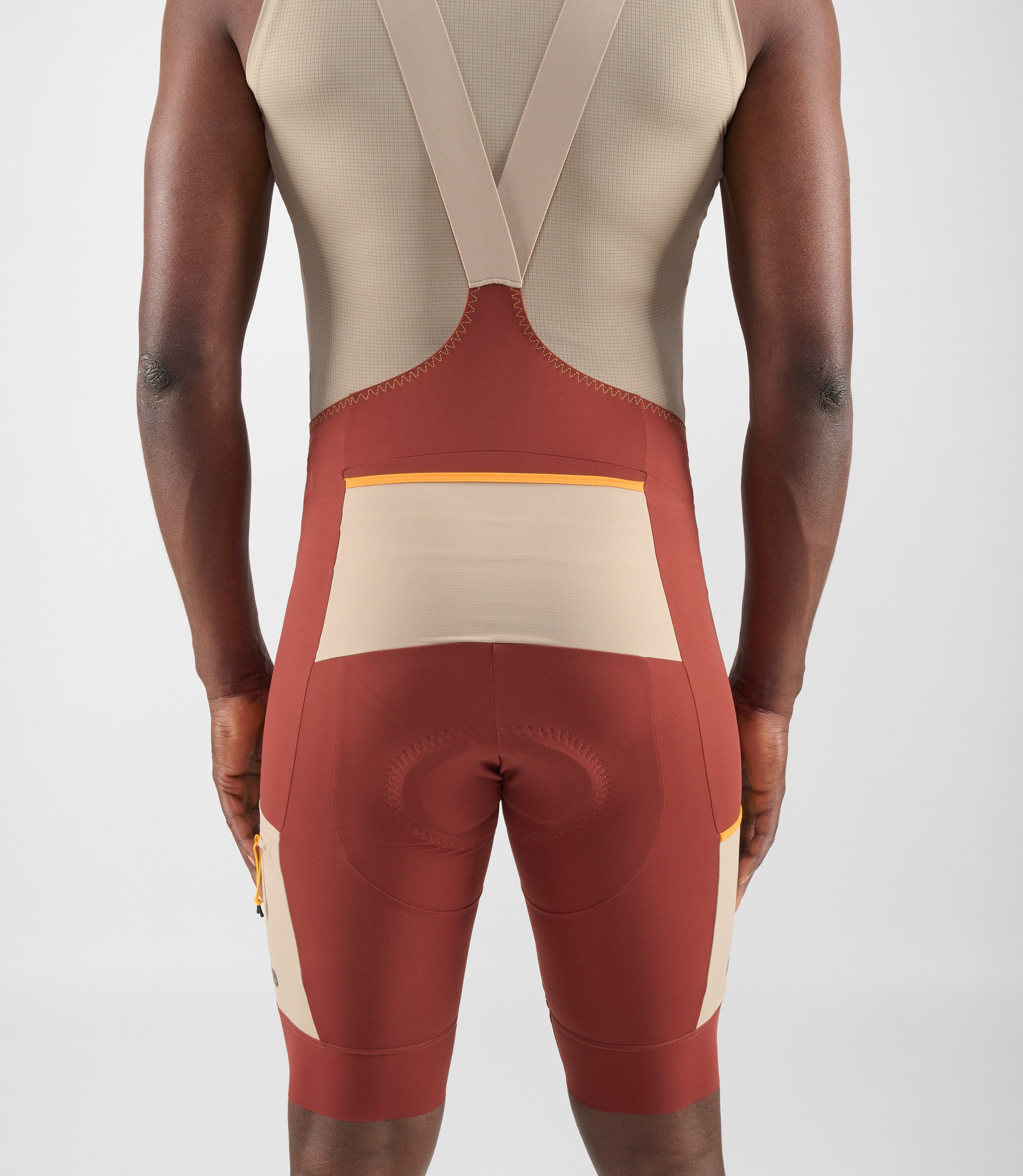 24SBBOD75PE_6_cycling cargo bibshort dark red men odyssey back pocket pedaled