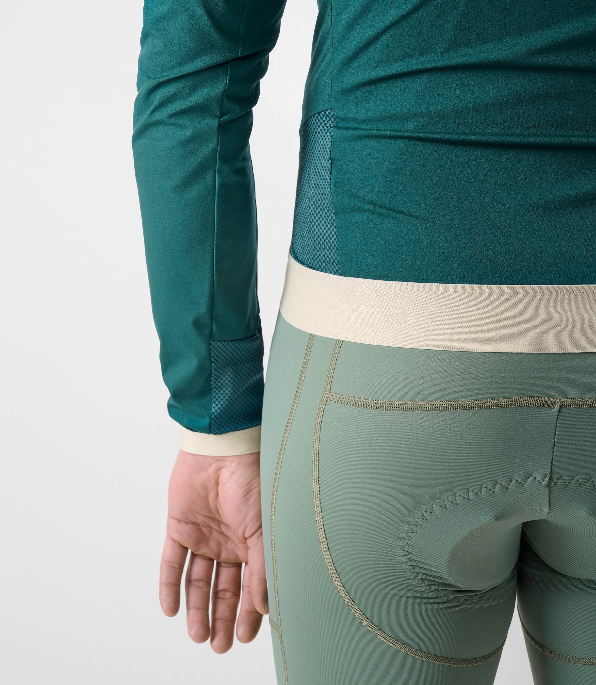 24SJKEL18PE_8_men cycling windproof jacket light teal element cuff pedaled