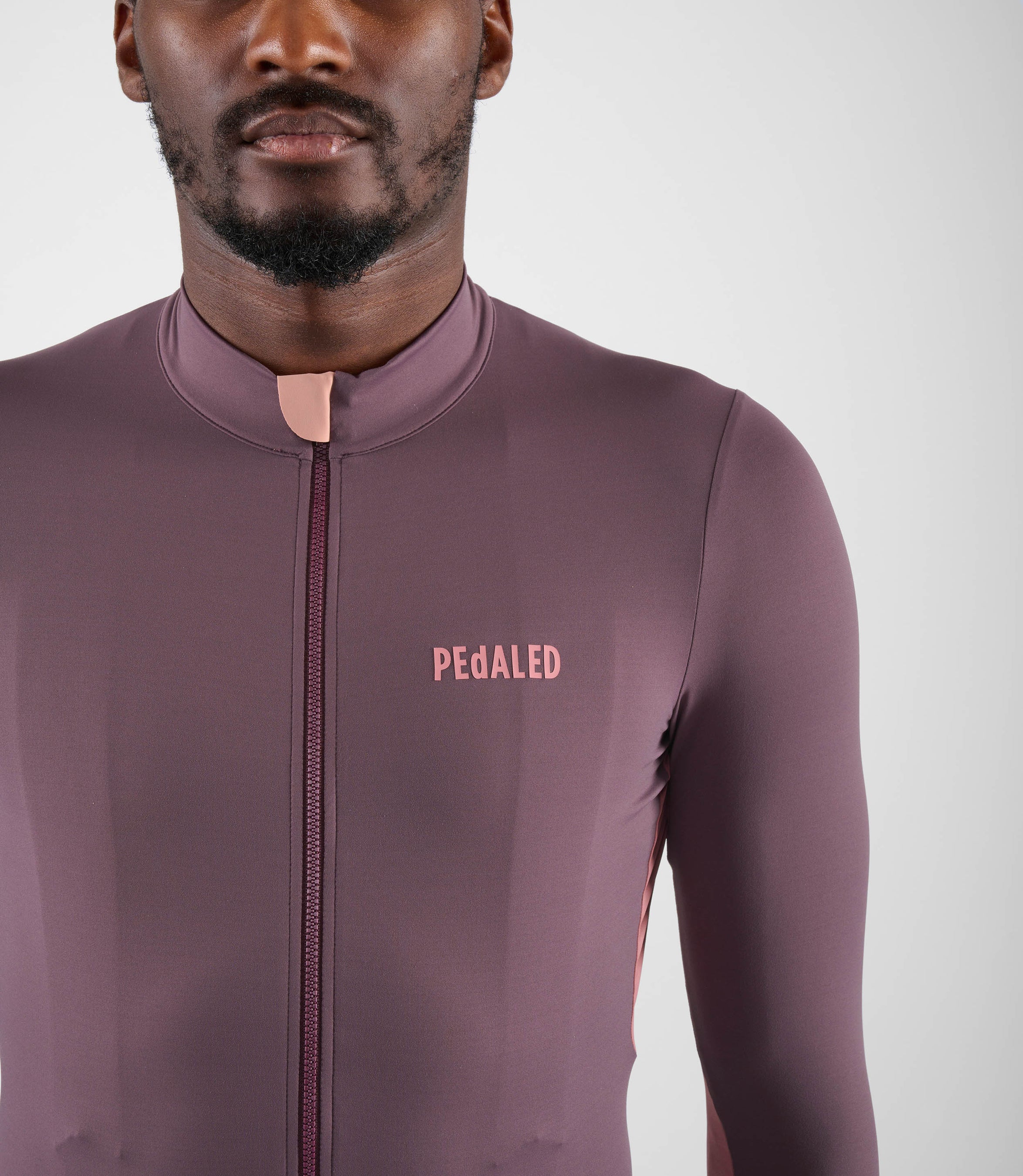 24WJSEL10PE_5_men cycling jersey long sleeve purple element front pedaled
