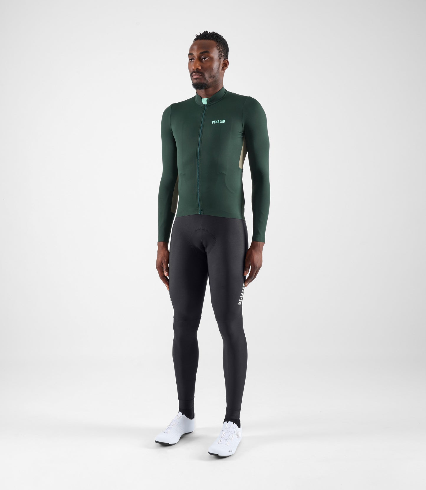 24WJSEL11PE_3_men cycling jersey long sleeve green element total body front pedaled