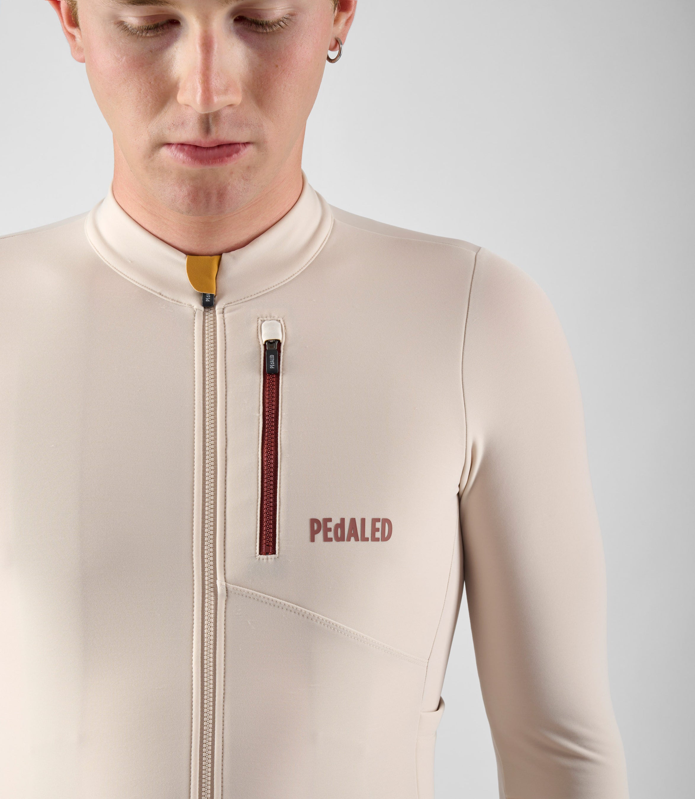 24WJSOD0GPE_6_men cycling jersey cargo long sleeve off white odyssey front zip pedaled