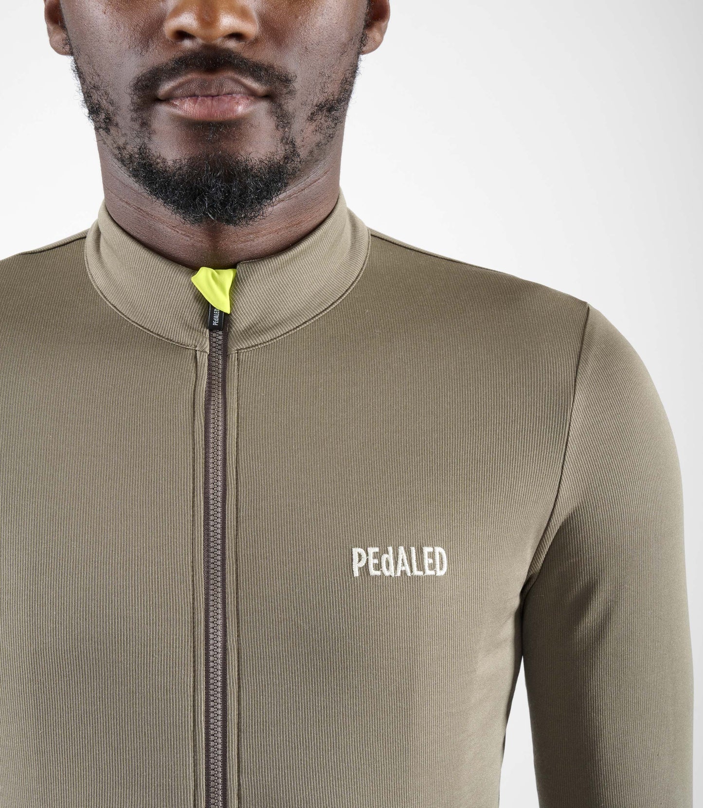 24WMJEL02PE_5_men cycling jersey merino long sleeve grey element front pedaled