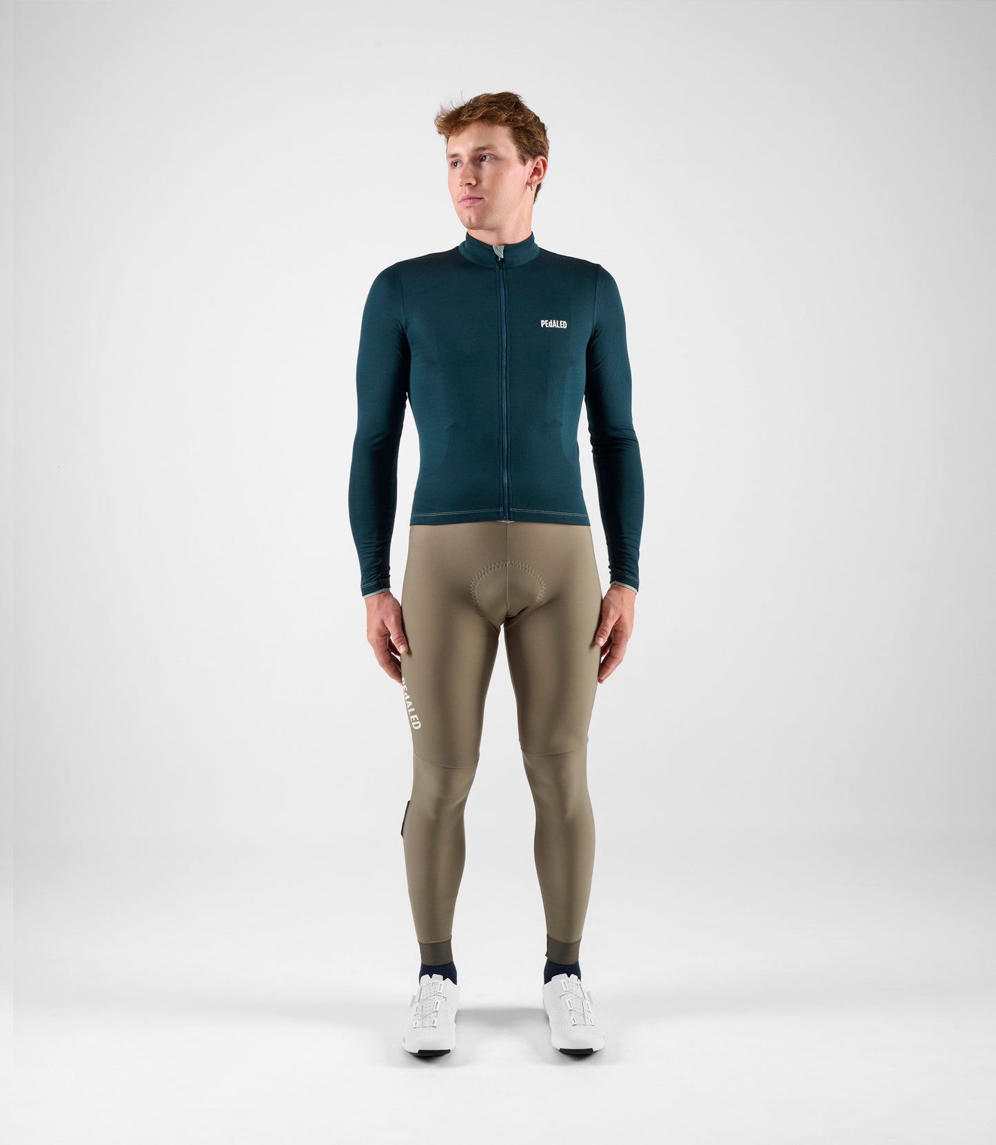 24WMJEL05PE_3_men cycling jersey merino long sleeve navy element total body front pedaled