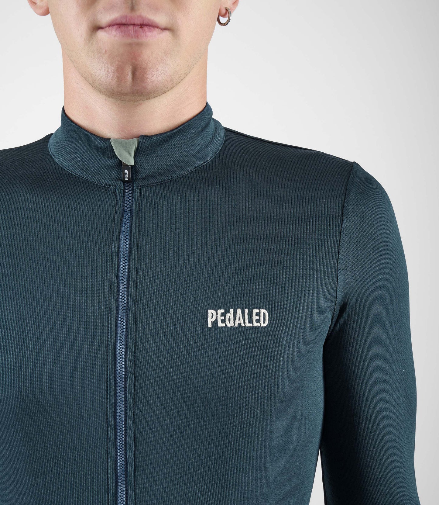 24WMJEL05PE_5_men cycling jersey merino long sleeve navy element front pocket pedaled