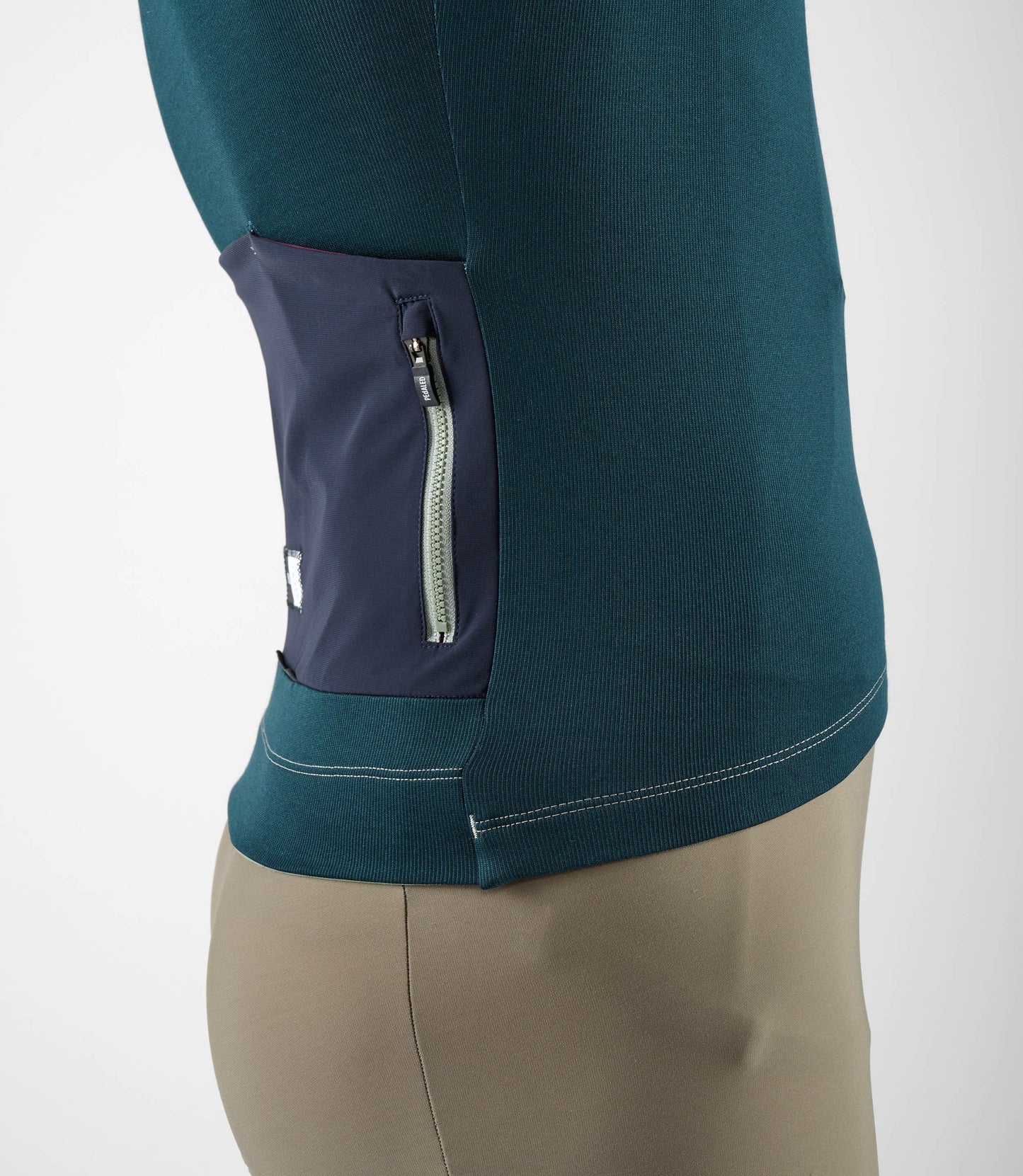 24WMJEL05PE_8_men cycling jersey merino long sleeve navy element side pocket pedaled