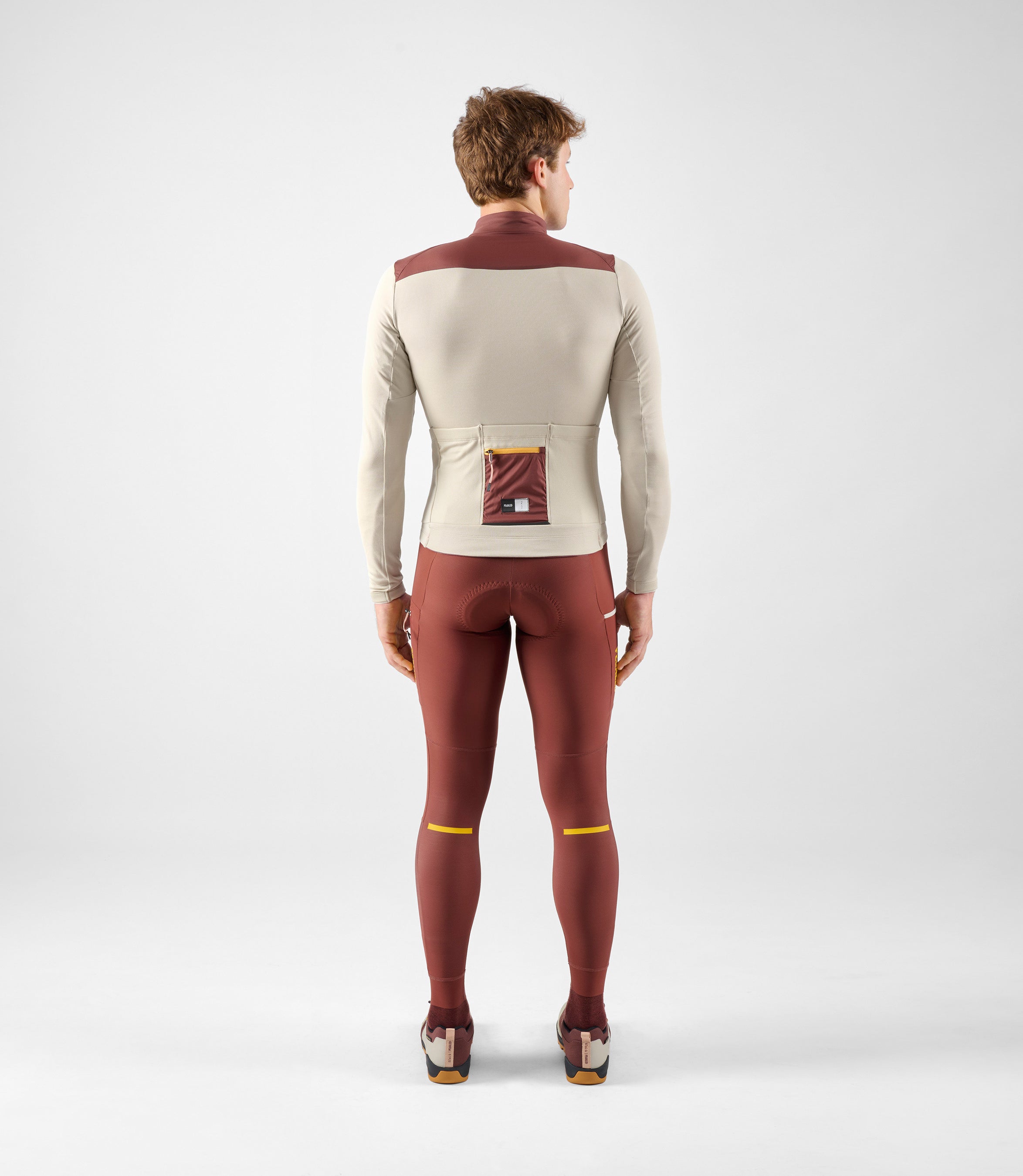 24WMJOD0GPE_4_men cycling merino jersey windblock long sleeve off white odyssey total body back pedaled