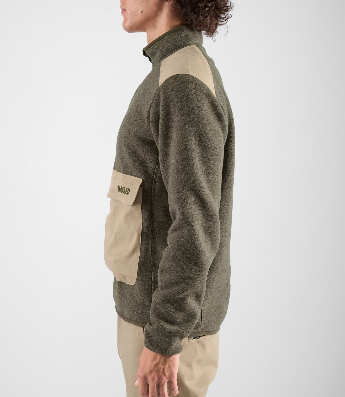 24WPUUR11PE_8_men cycling anorak green urban side pedaled