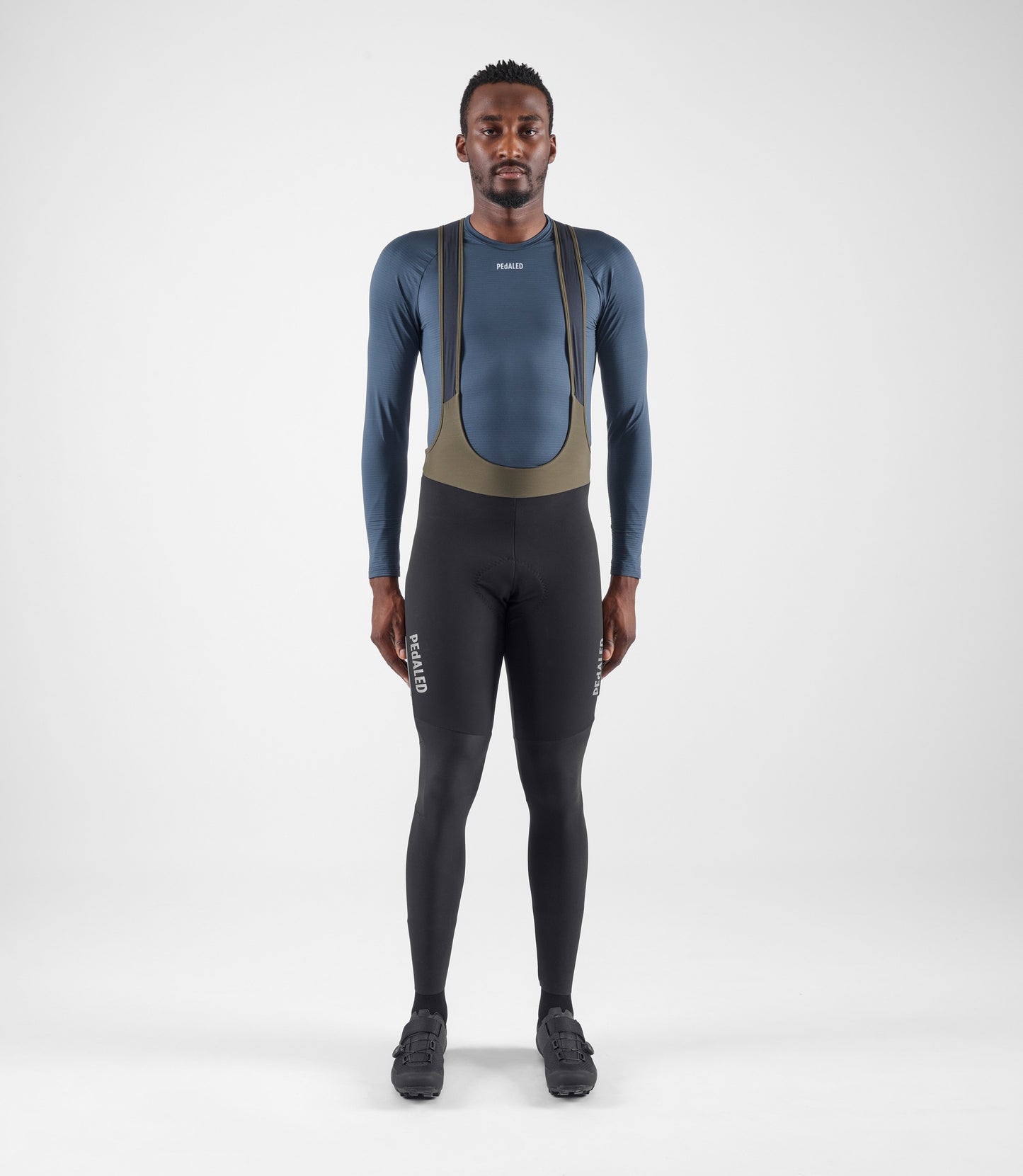 24WTBEL05PE_3_men cycling thermo base layer navy element total body front pedaled