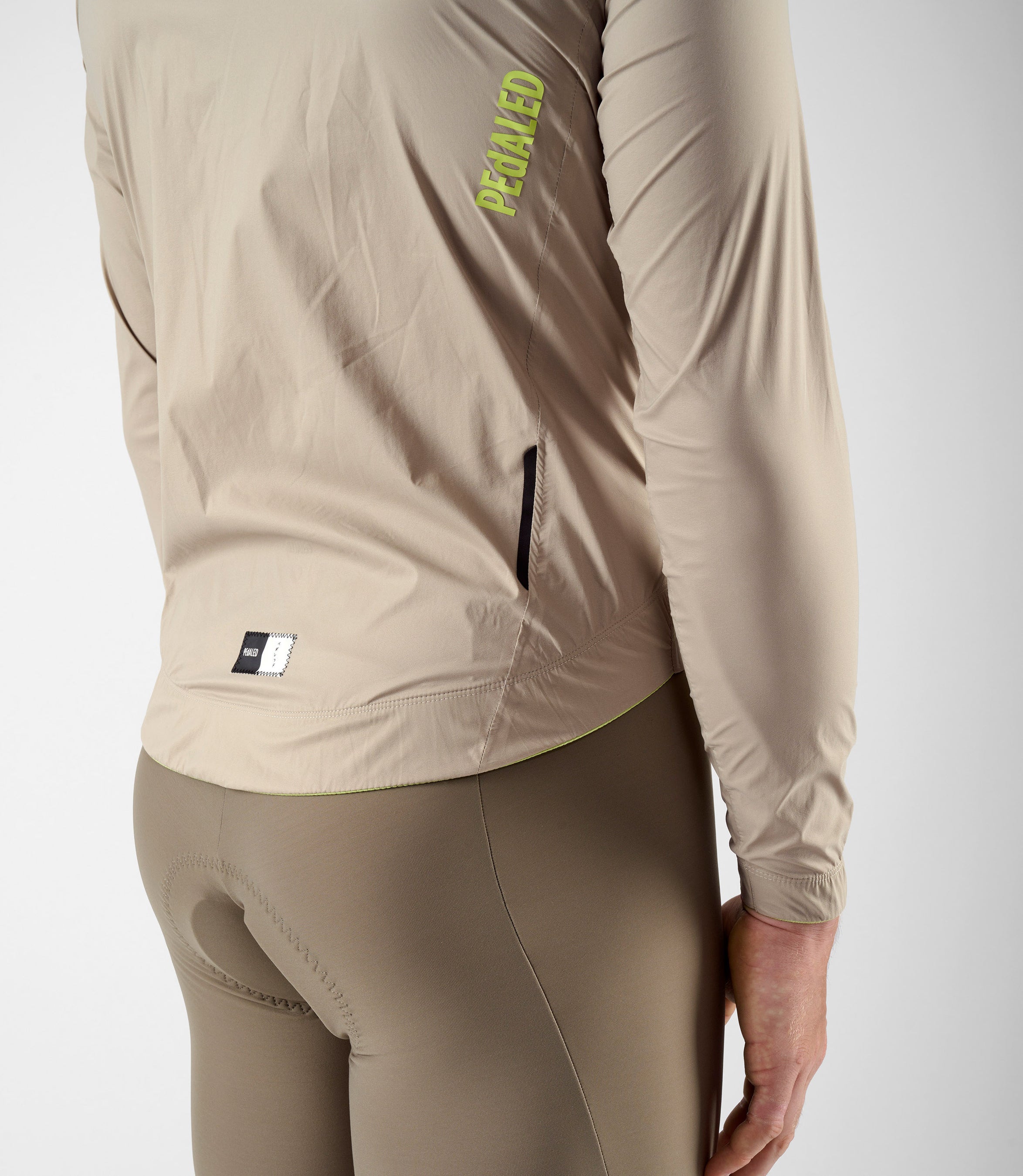 24WWJEL0GPE_6_men cycling waterproof jacket off white element side pedaled