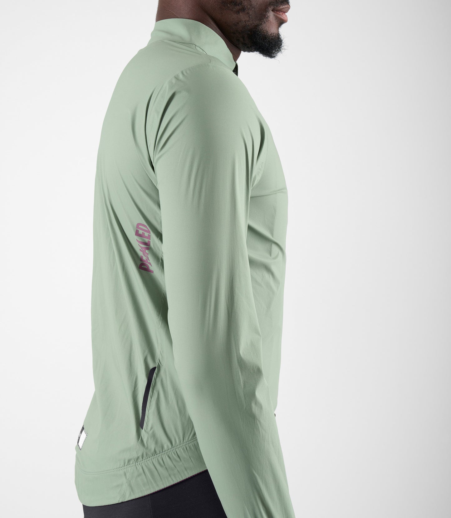 24WWJEL11PE_7_men cycling waterproof jacket green element side pedaled