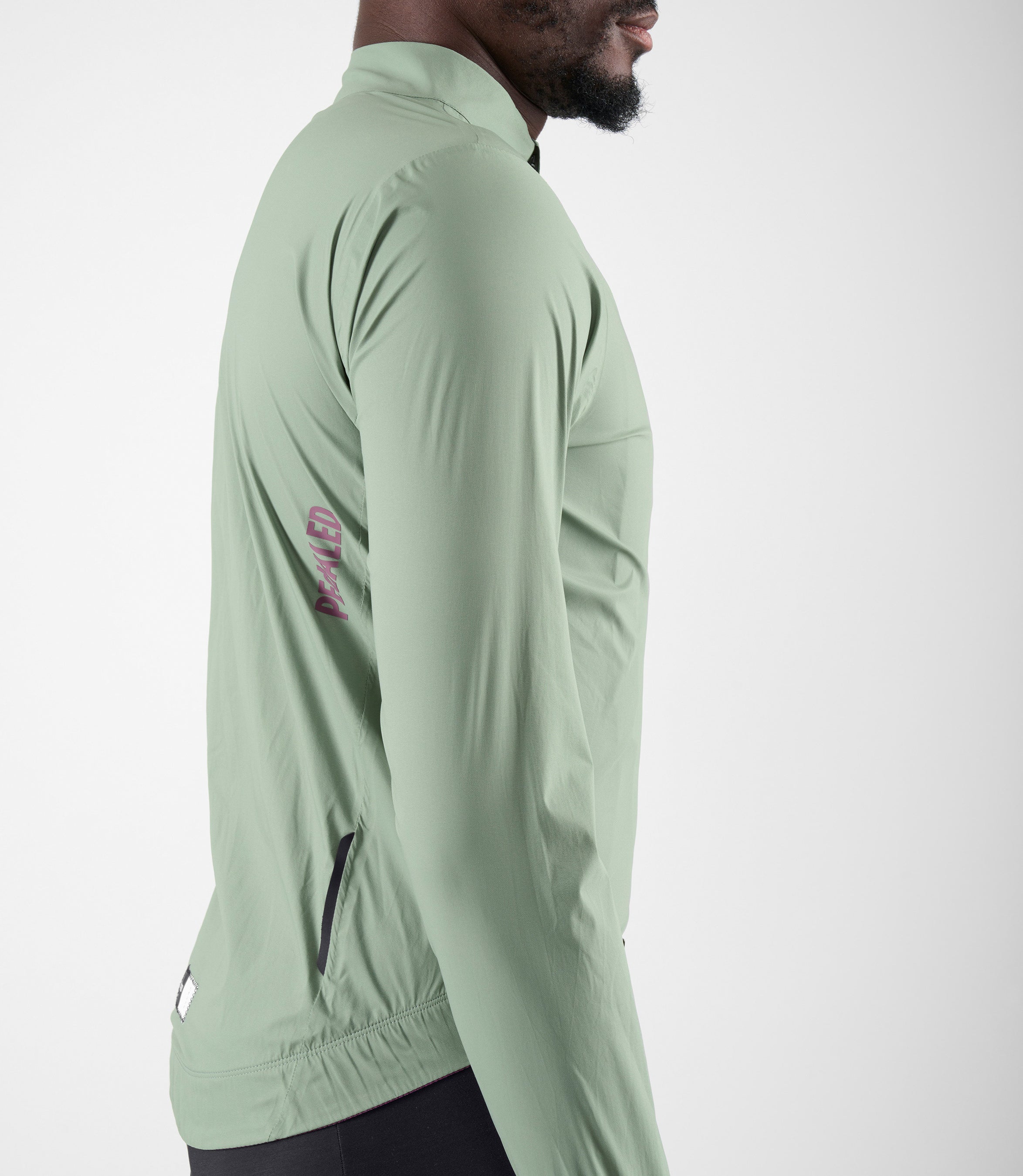 24WWJEL11PE_7_men cycling waterproof jacket green element side pedaled