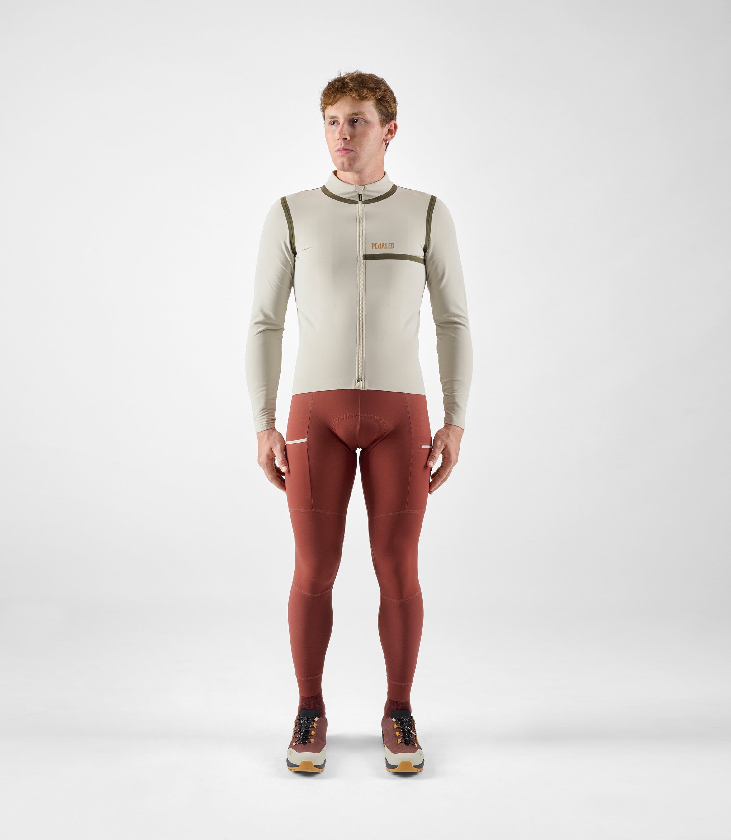 24WWJOD0GPE_3_men cycling jacket thermo waterproof off white odyssey total body front pedaled