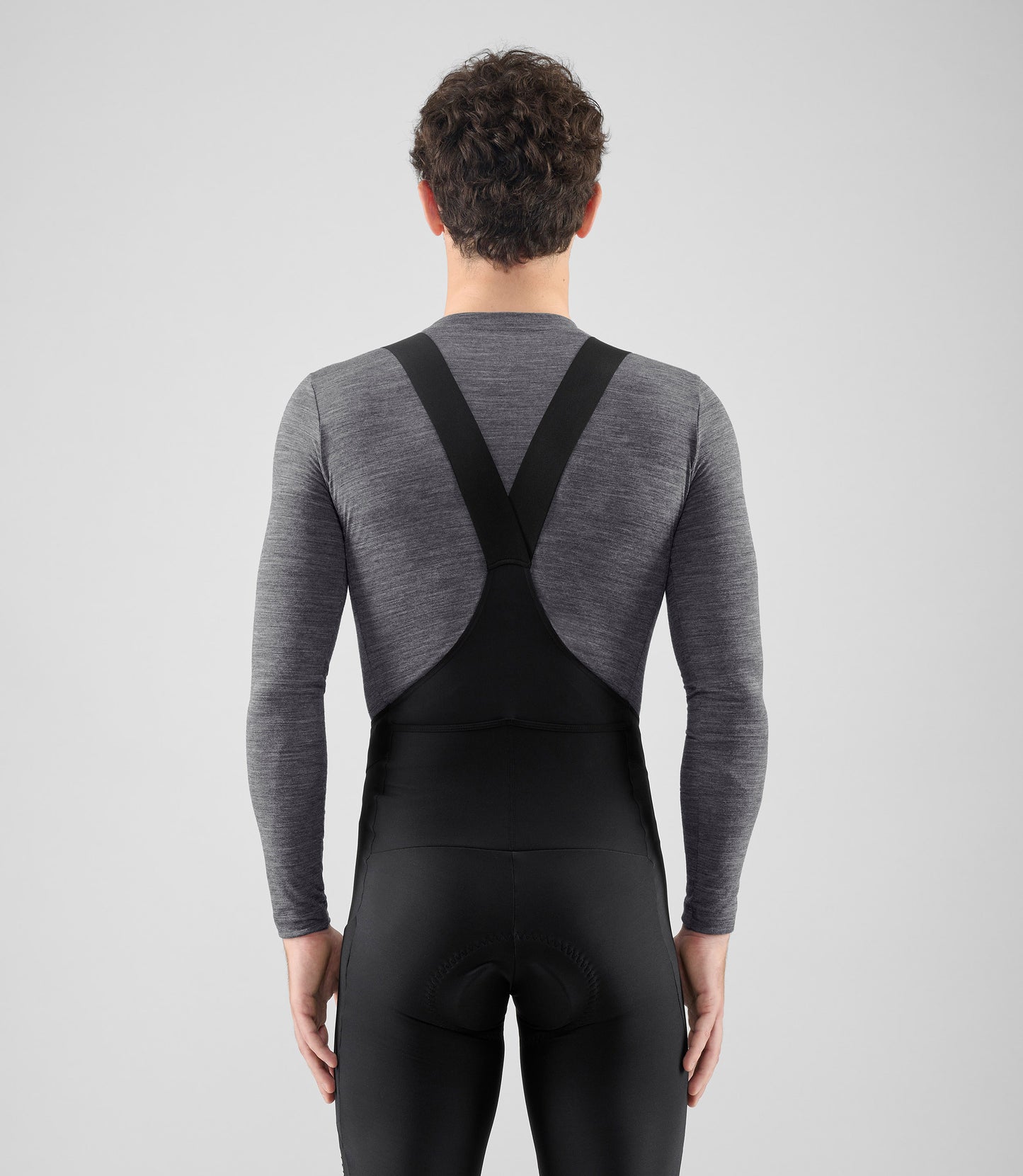 25WMBEL02PE_4_men cycling merino base layer grey element total body back pedaled
