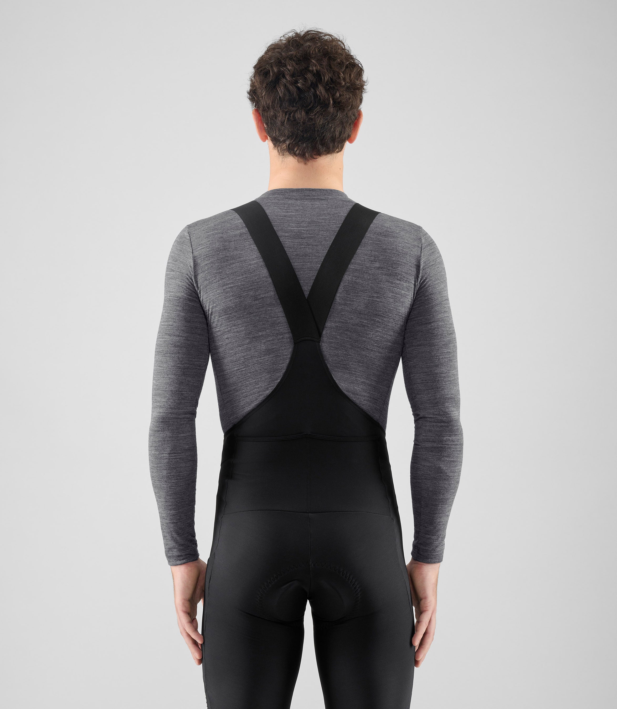 25WMBEL02PE_4_men cycling merino base layer grey element total body back pedaled