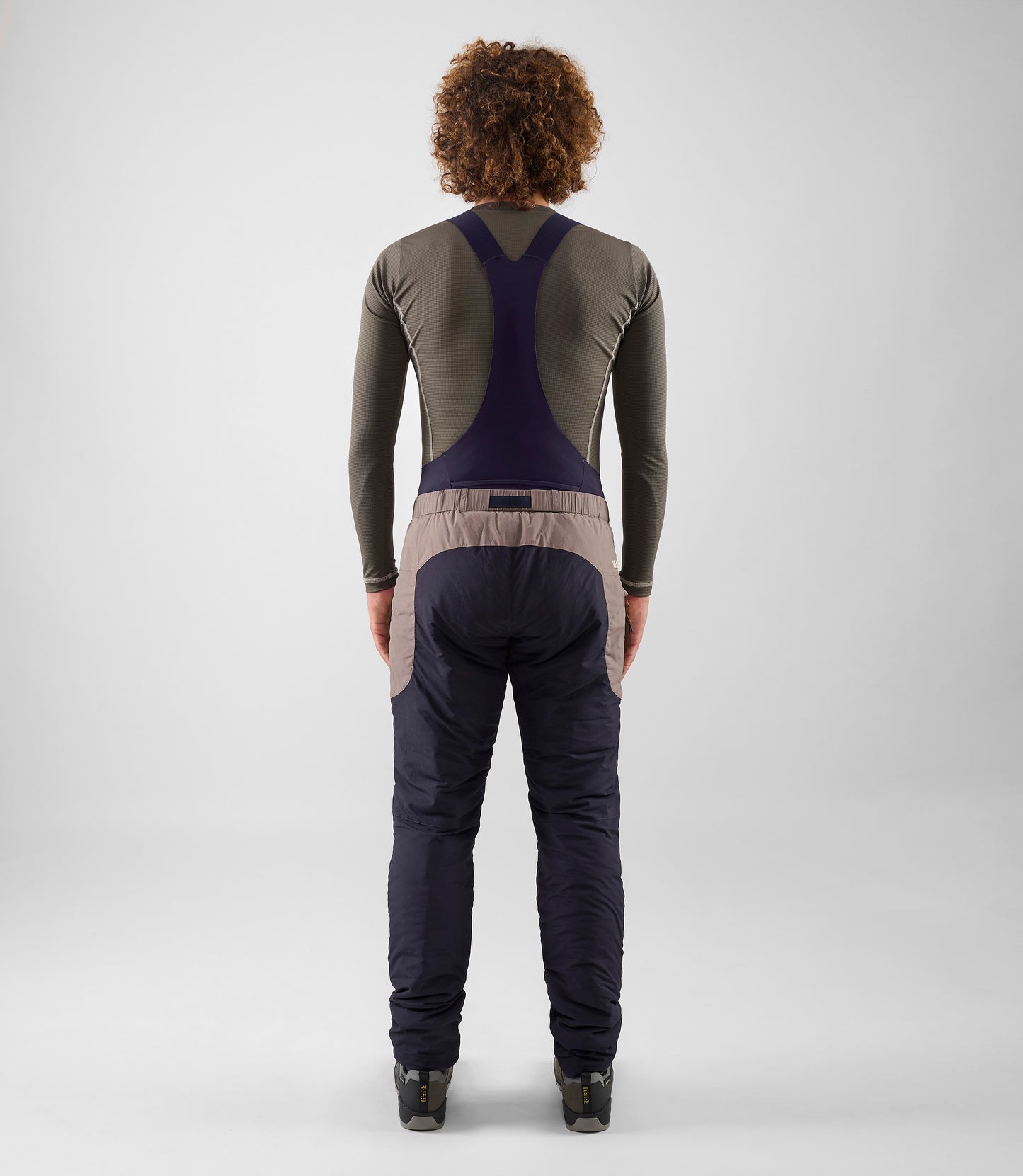 25WPAOD74PE_4_men cycling insulated pants dark navy odyssey total body back pedaled