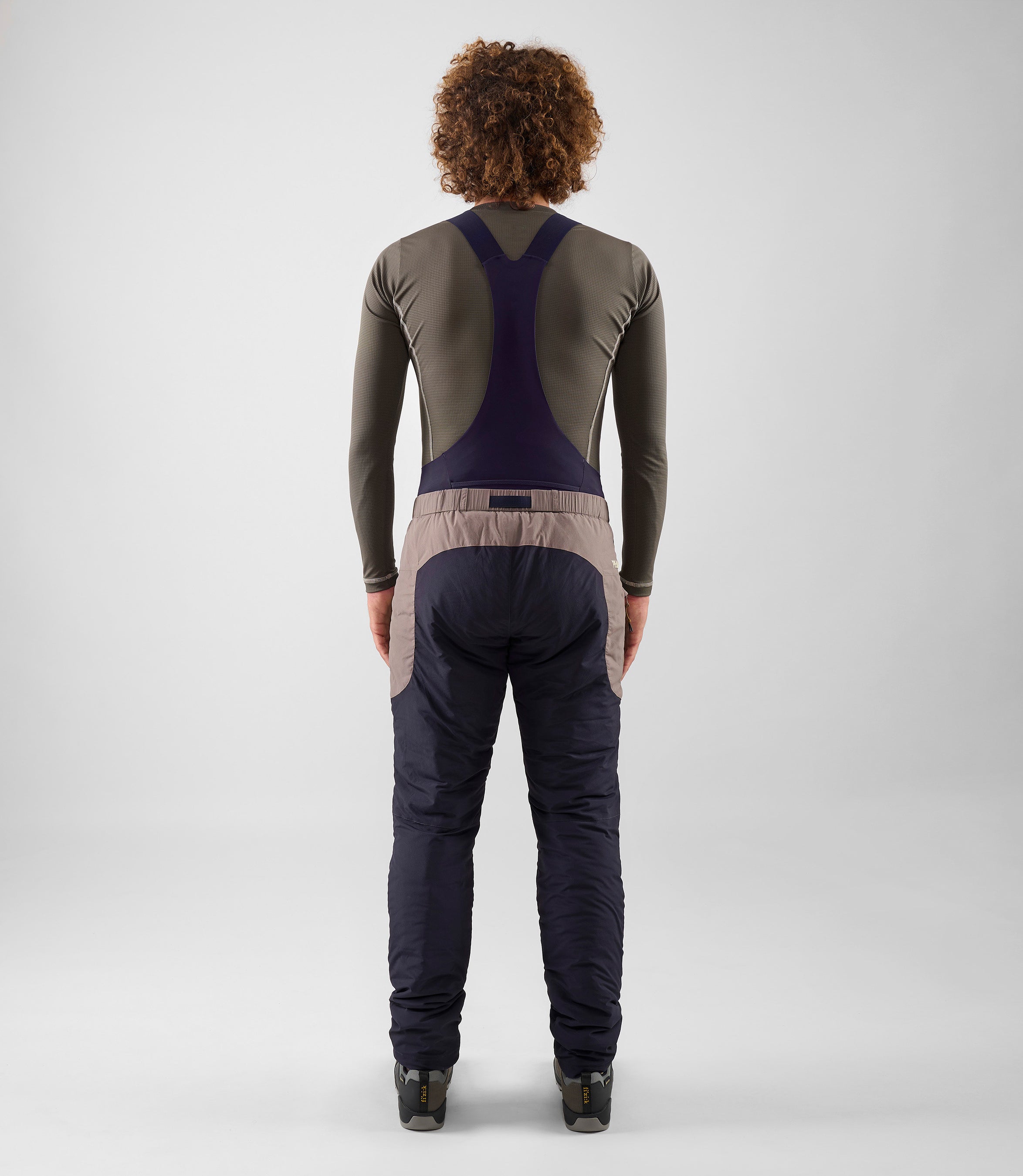 25WPAOD74PE_4_men cycling insulated pants dark navy odyssey total body back pedaled