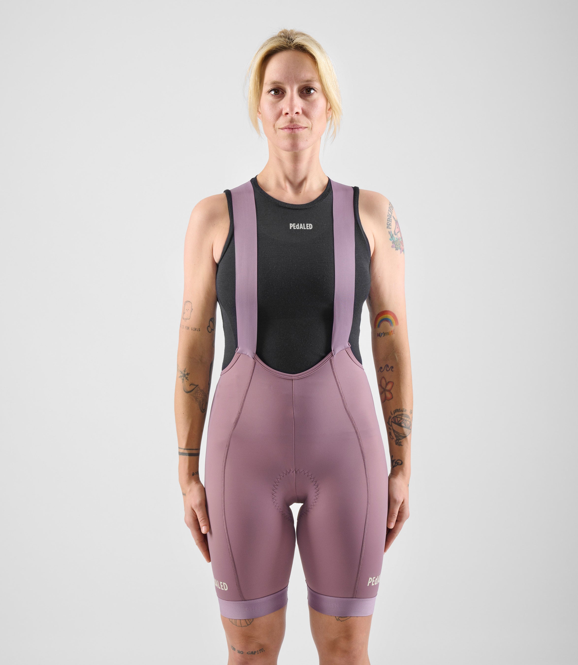 W4SBBEL0IPE_3_women cycling bibshorts element lilac total body front pedaled