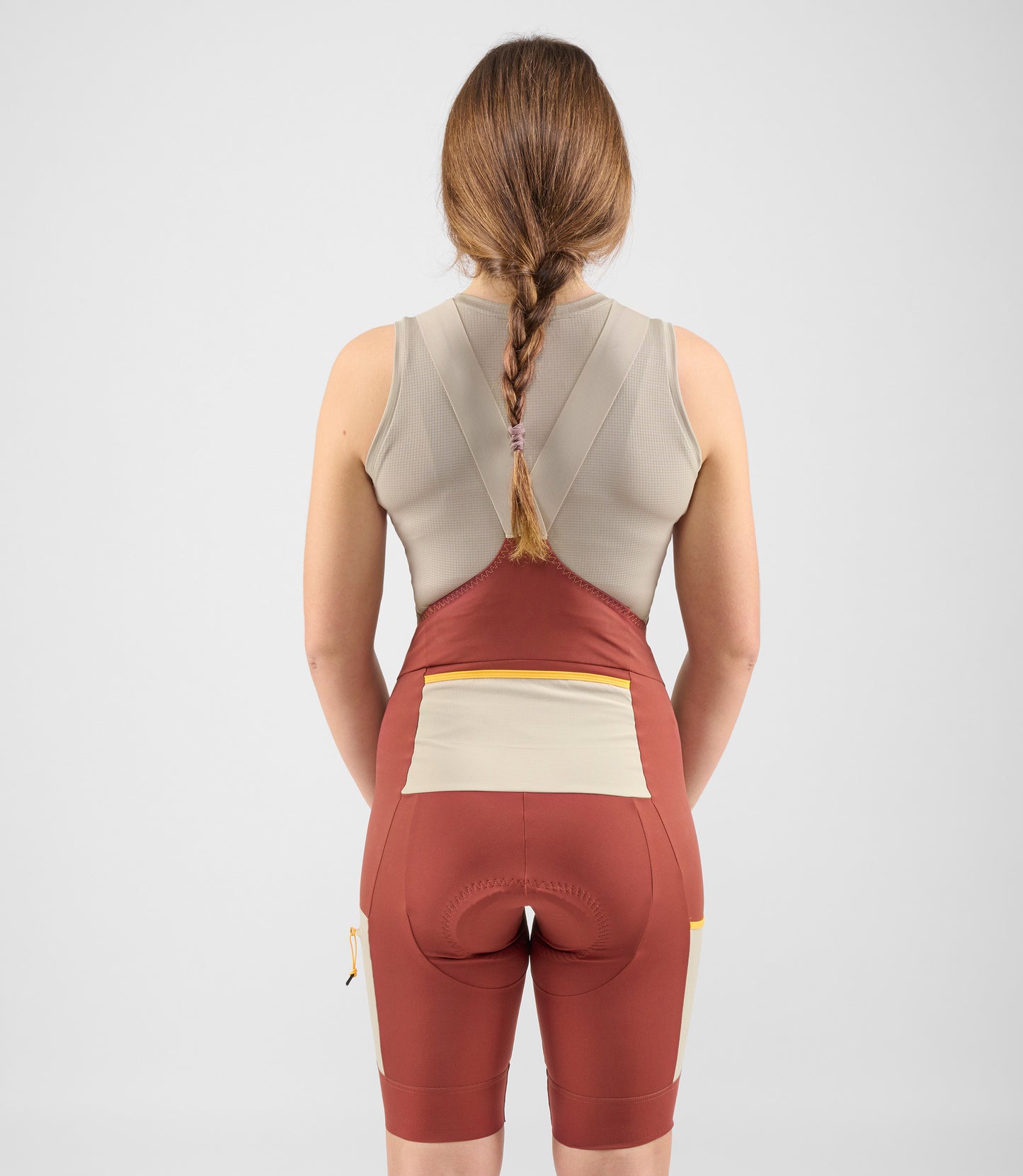 W4SBBOD75PE_4_women cycling cargo bibshort dark red odyssey total body back pedaled