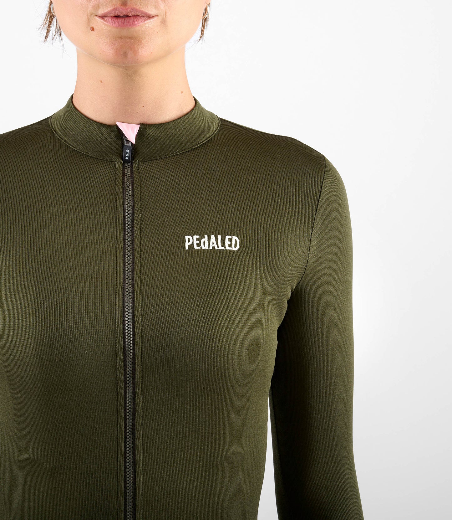 W4WMJEL11PE_8_women cycling jersey merino long sleeve green element front pedaled