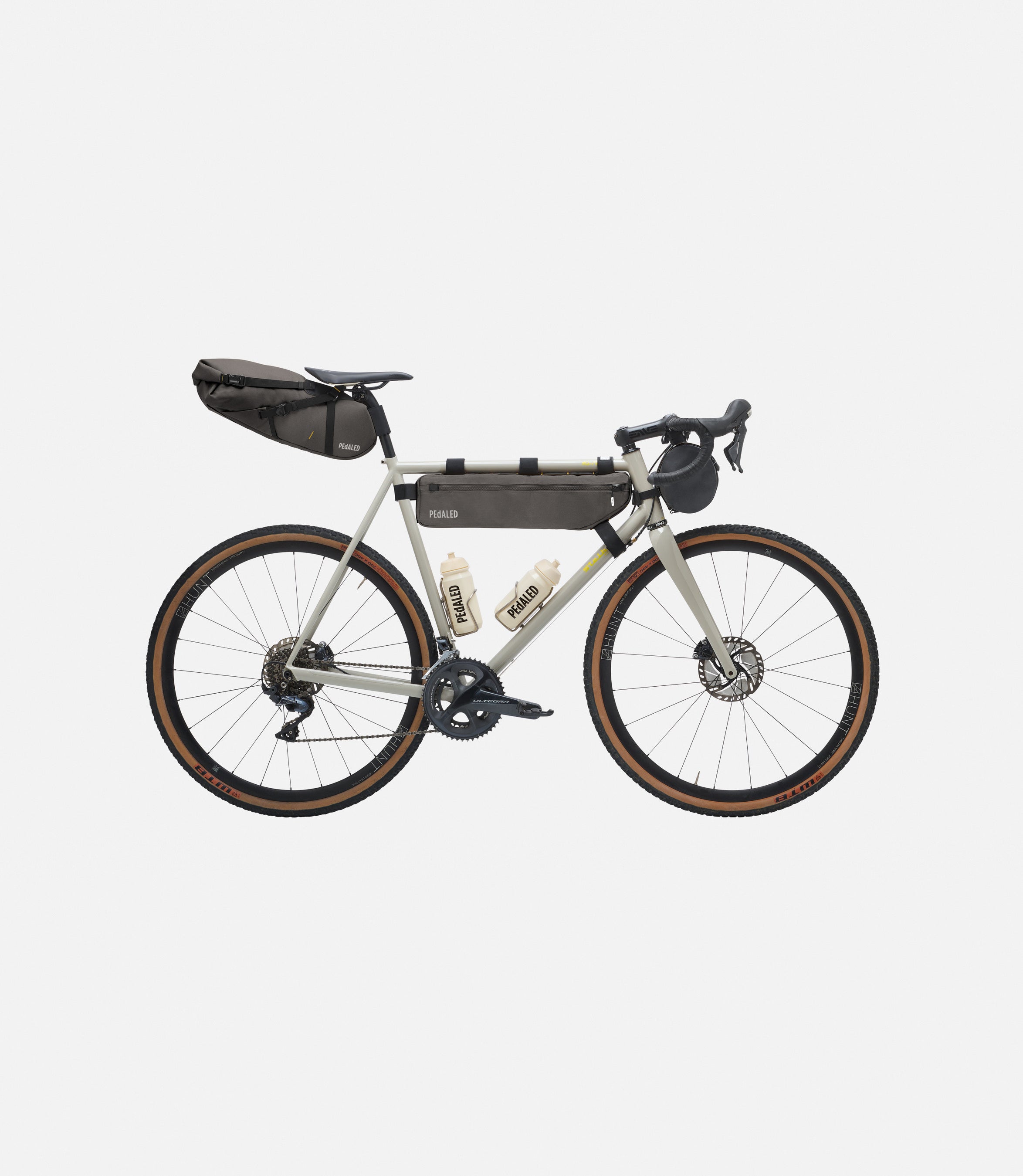 234HBOD23PE_2_bikepacking bag complete kit raven front pedaled 3