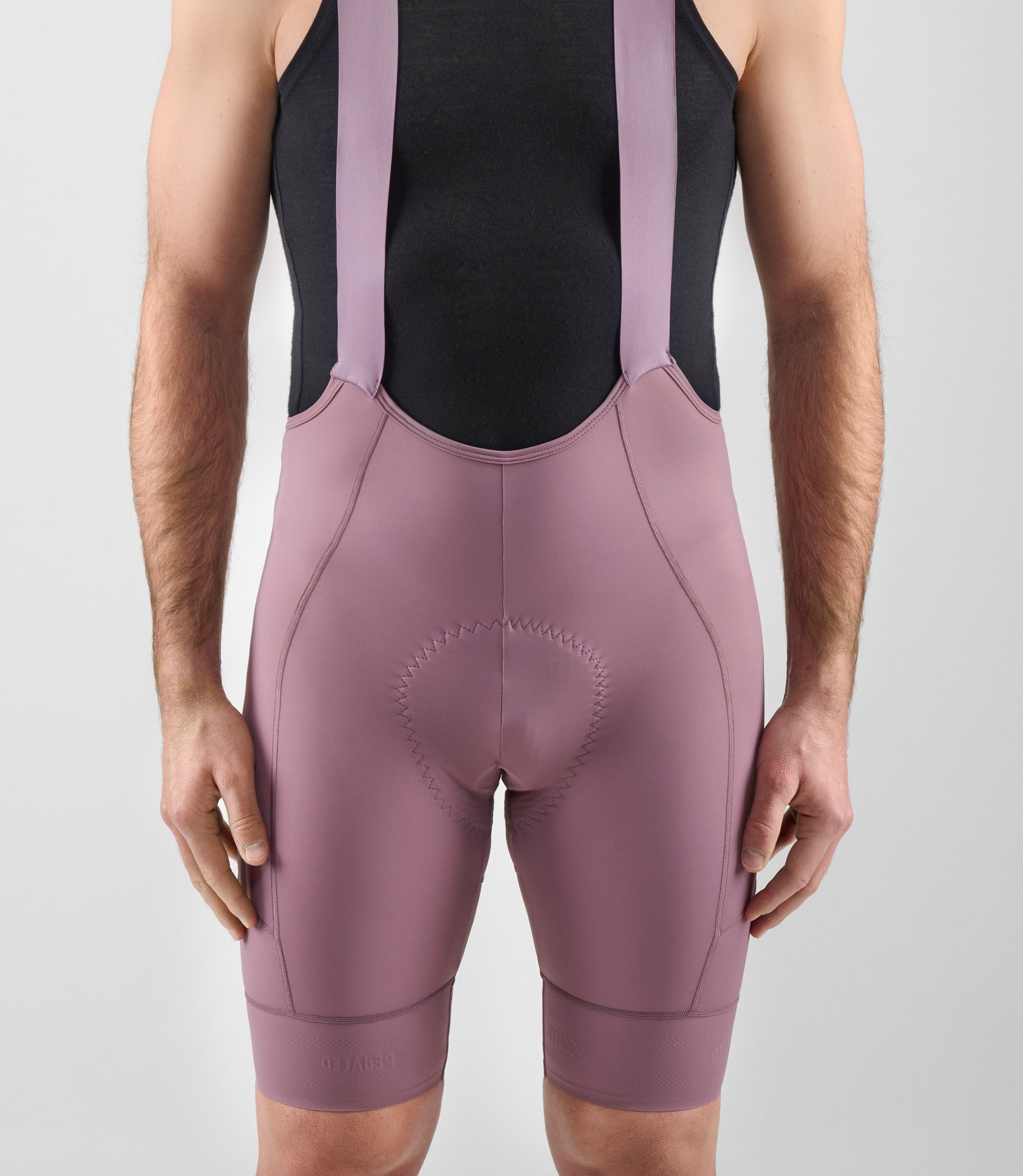 24SBBEL0IPE_7_men cycling bibshorts element lilac front pedaled