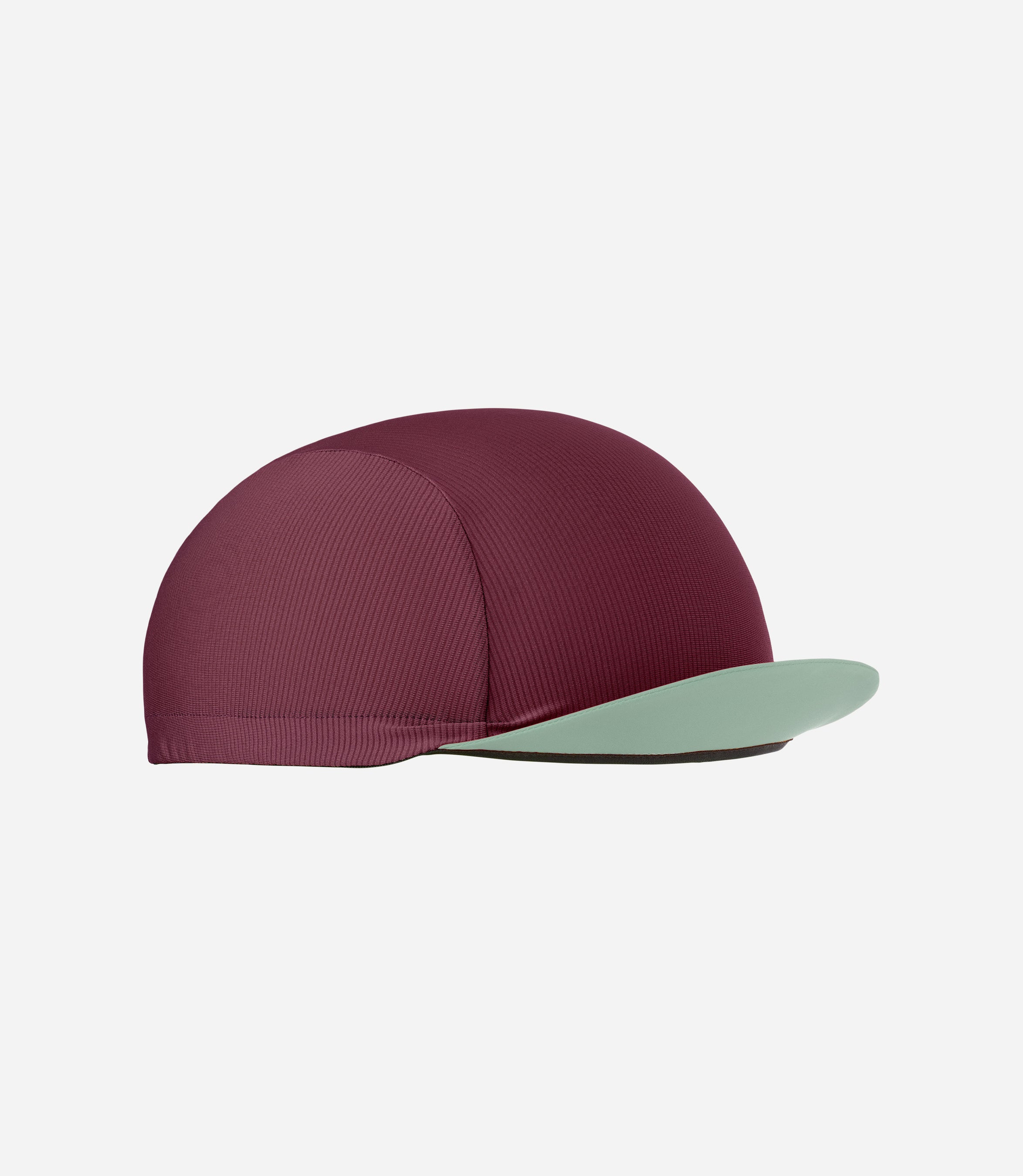 24SCAEL26PE_2_cycling cap burgundy element side pedaled