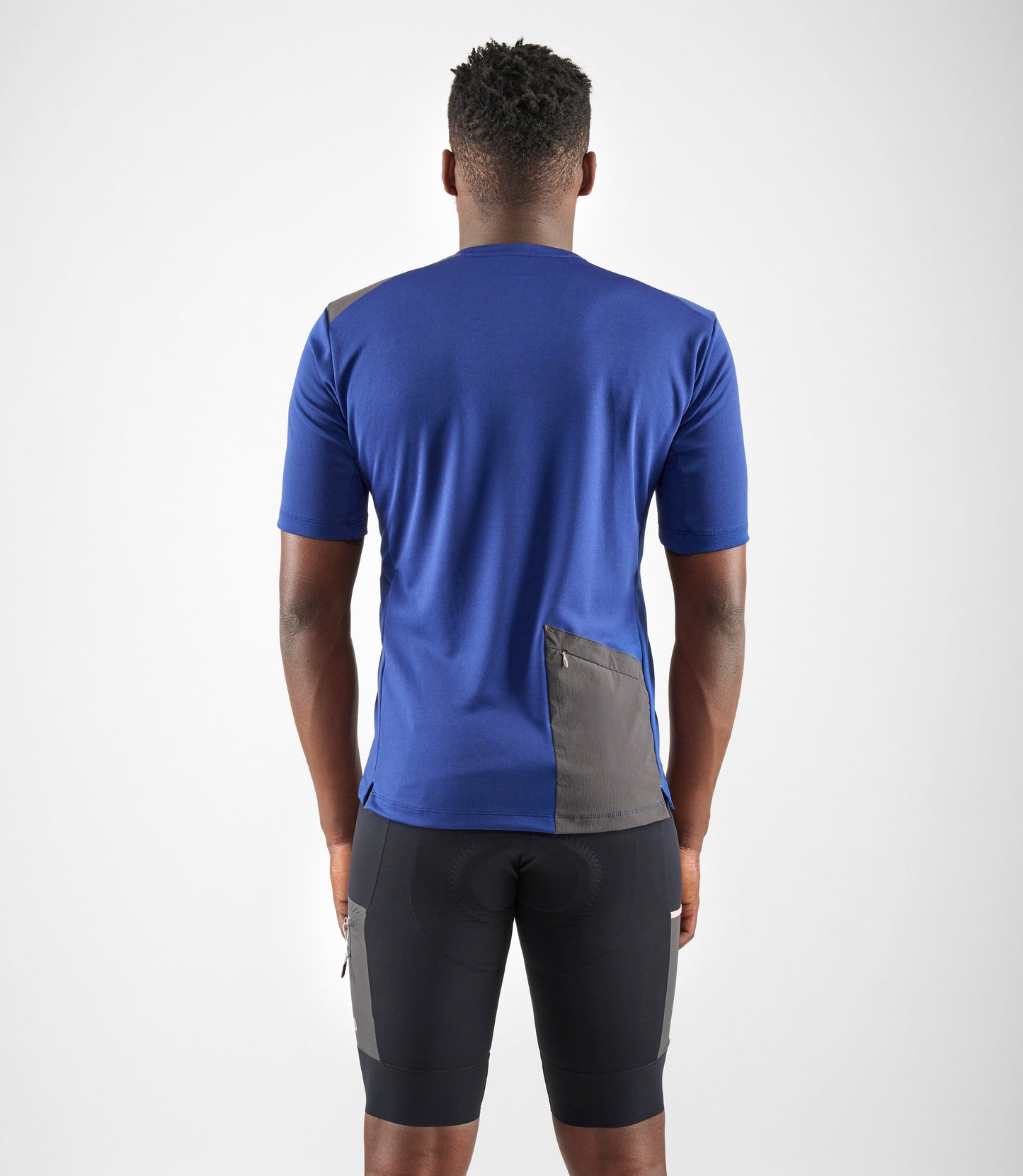 24SMTOD07PE_4_men cycling merino tee blue odyssey total body back pedaled