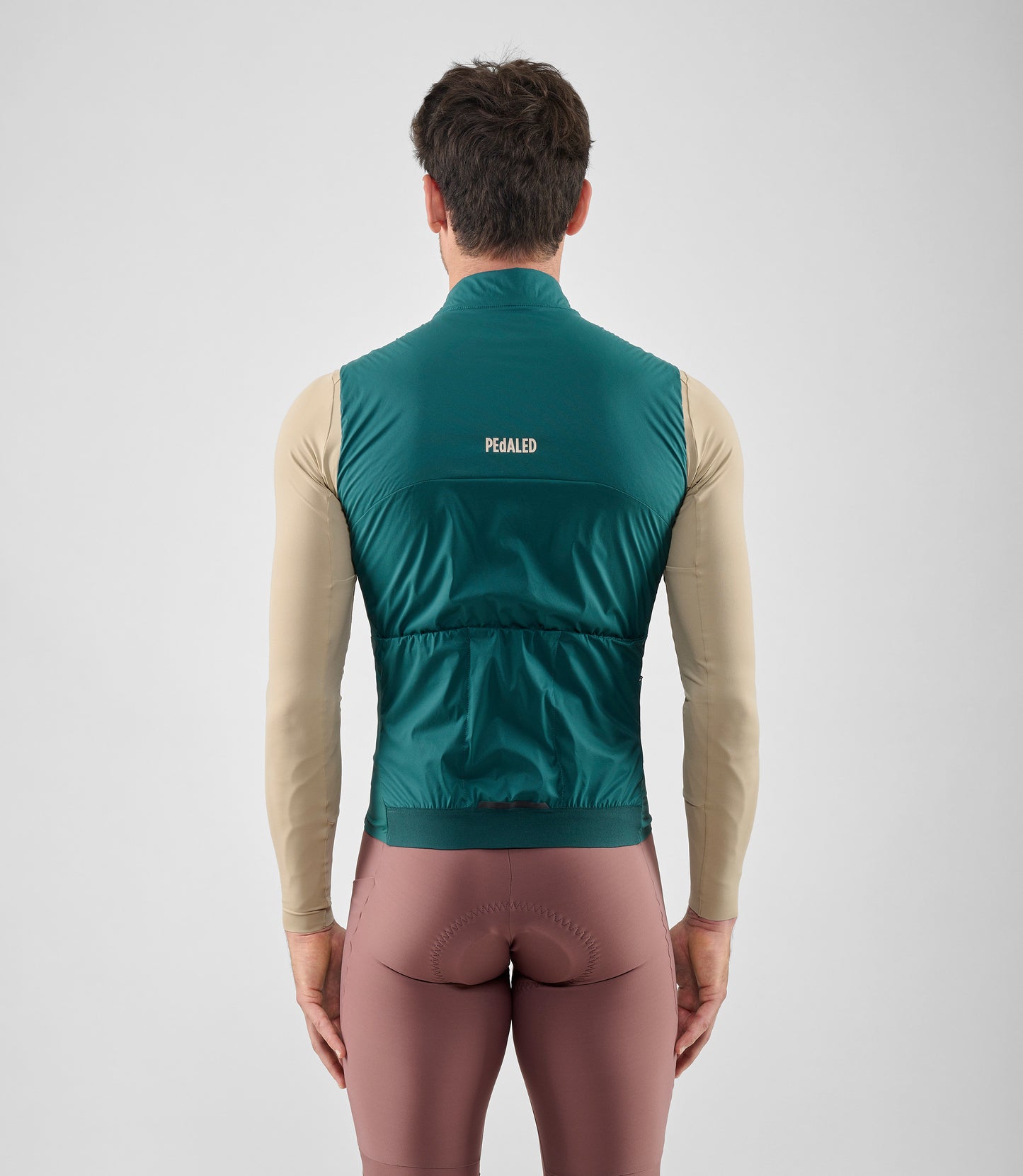 25WAVEL18PE_4_men cycling vest alpha teal element total body back pedaled