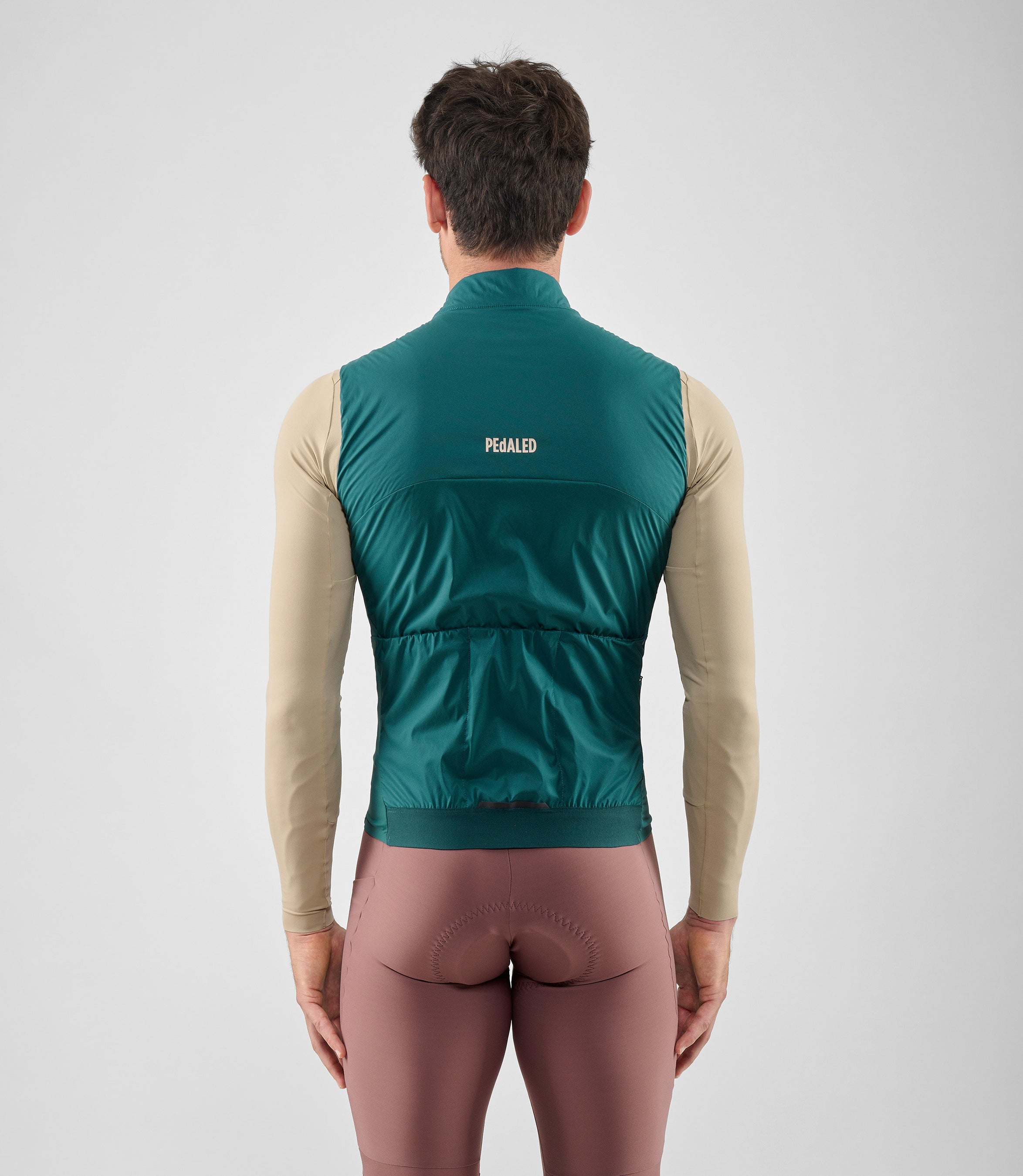 25WAVEL18PE_4_men cycling vest alpha teal element total body back pedaled