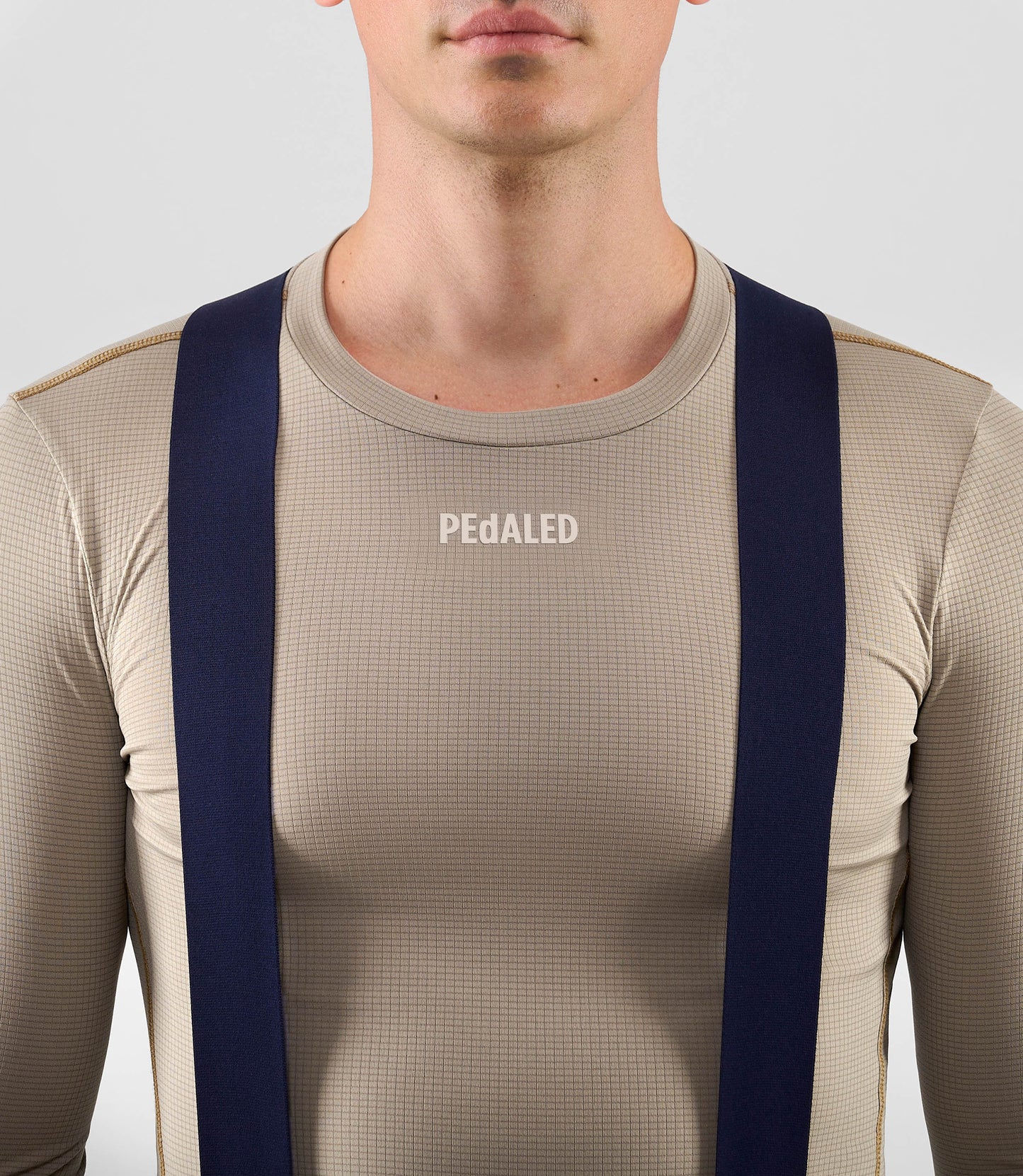 25WBLOD16PE_5_men cycling base layer long sleeve light grey ink odyssey front pedaled