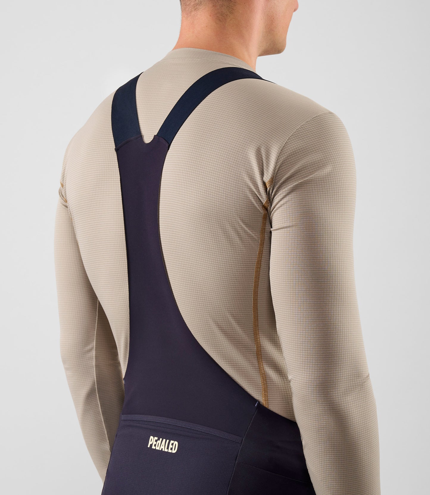 25WBLOD16PE_6_men cycling base layer long sleeve light grey ink odyssey back pedaled