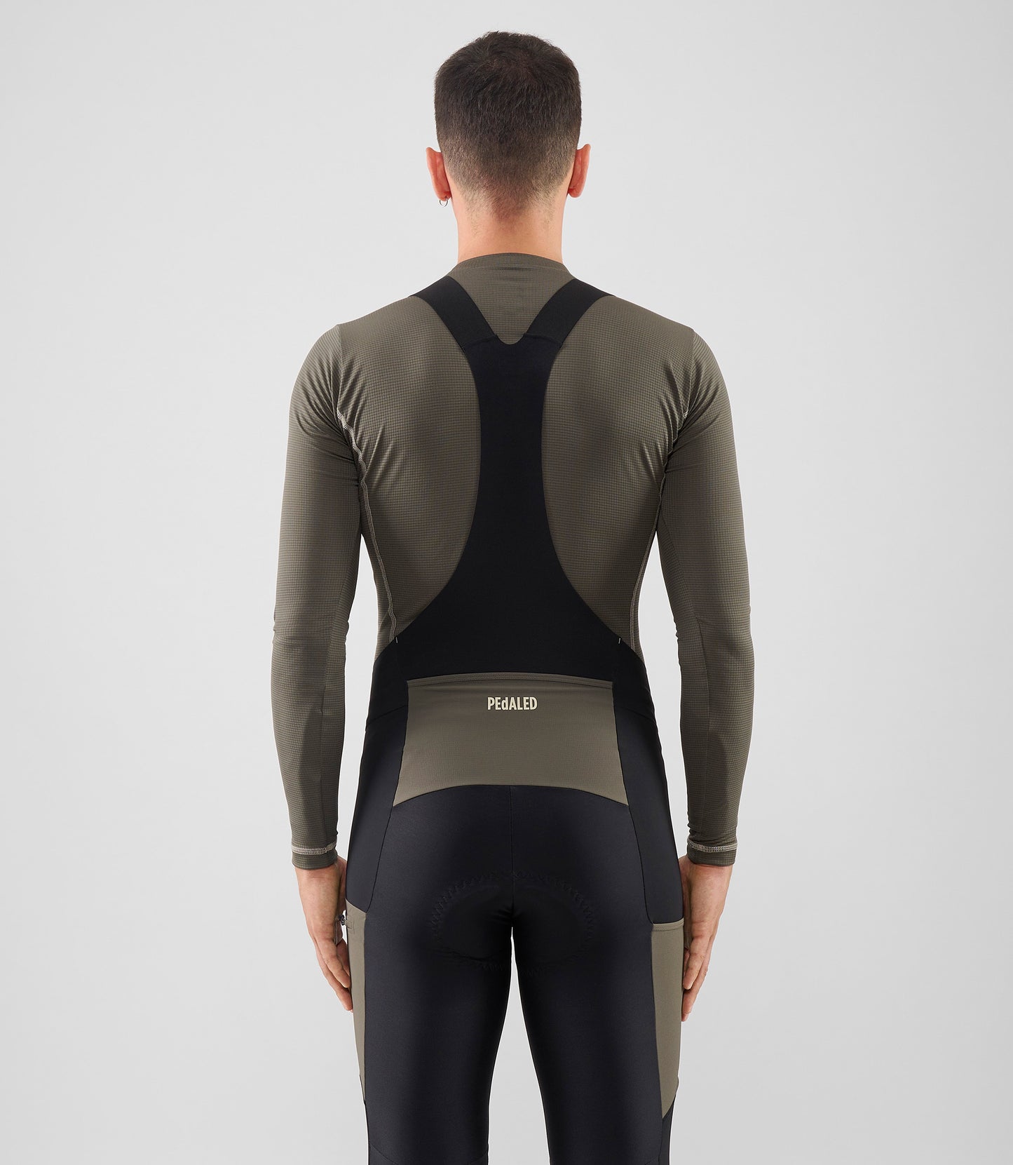 25WBLOD20PE_4_men cycling base layer long sleeve grey ink odyssey total body back pedaled