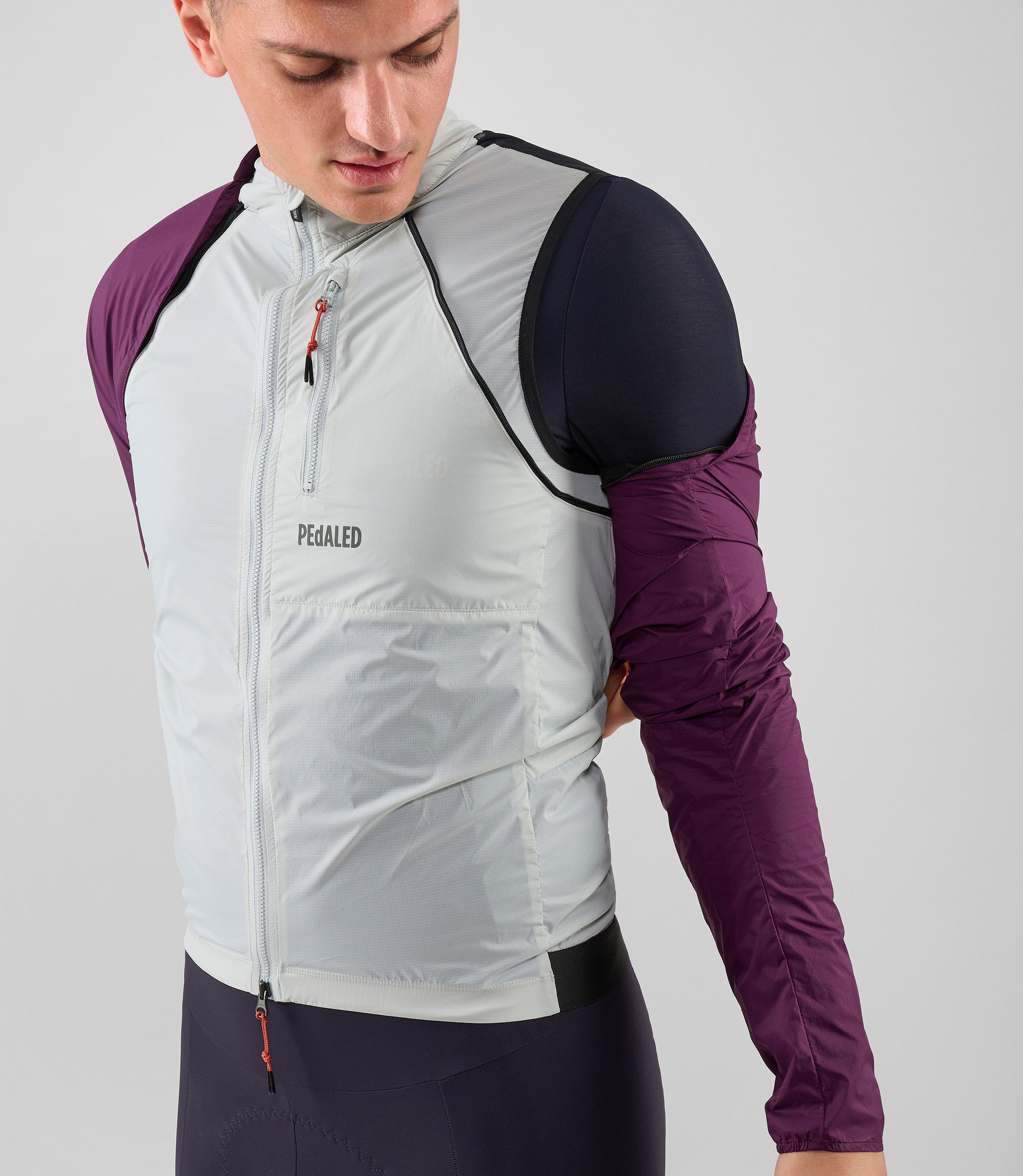 25WDJOD10PE_7_men cycling detachable purple odyssey left sleeve 5 pedaled