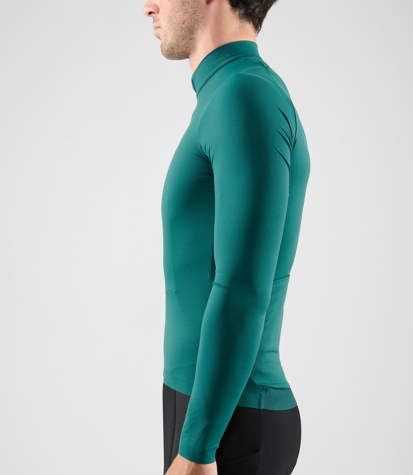 25WJSEL18PE_6_men cycling jersey long sleeve teal element side pedaled