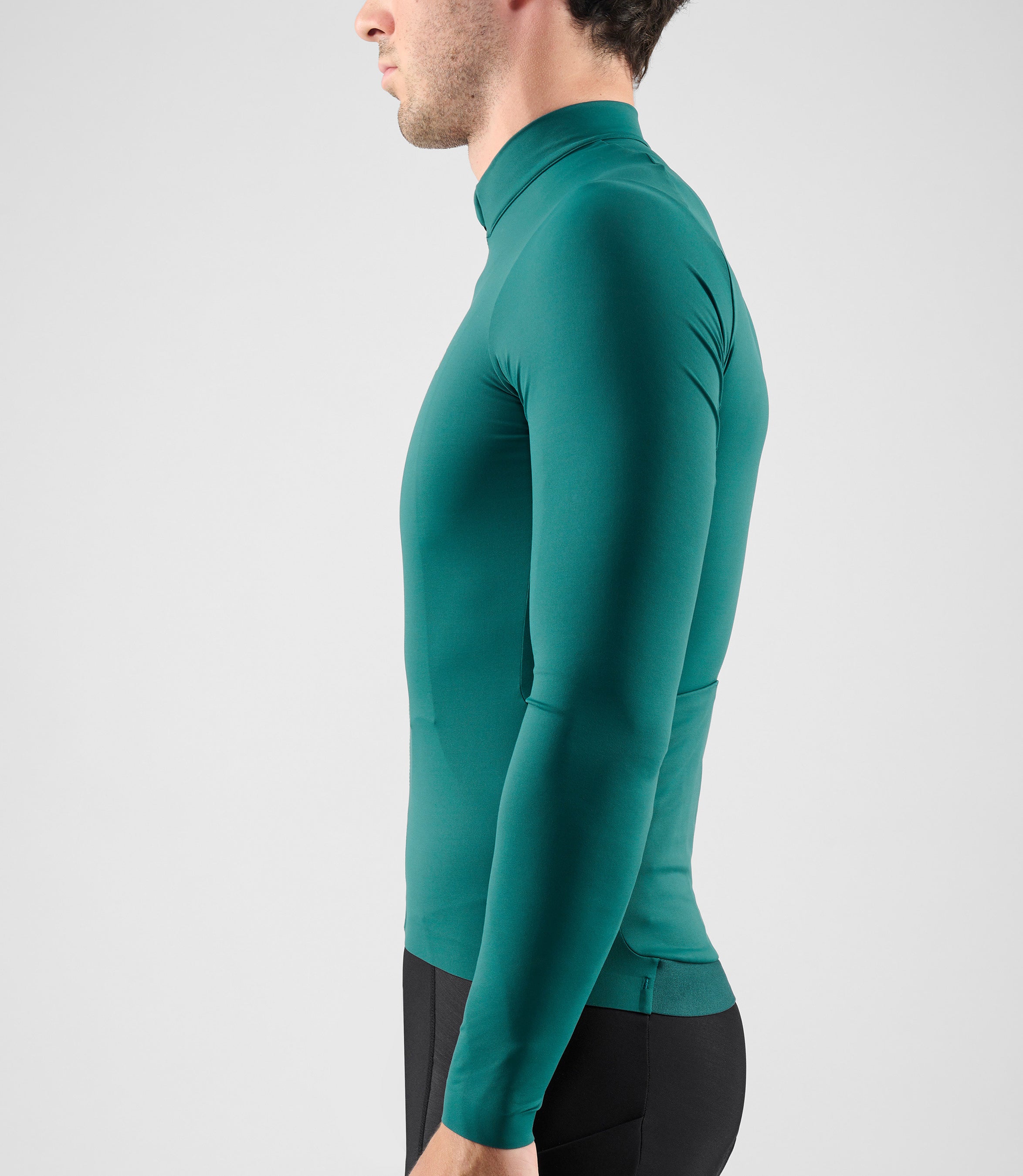25WJSEL18PE_6_men cycling jersey long sleeve teal element side pedaled