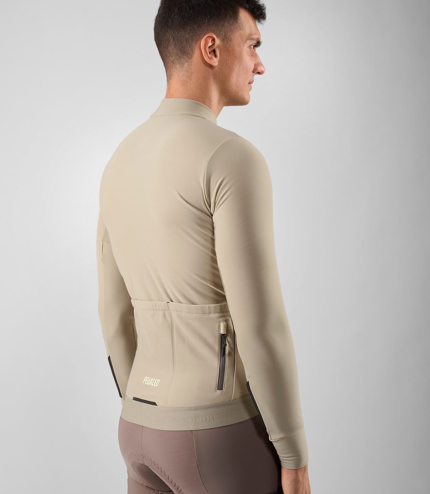 25WJSOD04PE_8_men cycling cargo adventure jersey long sleeve beige odyssey back pedaled