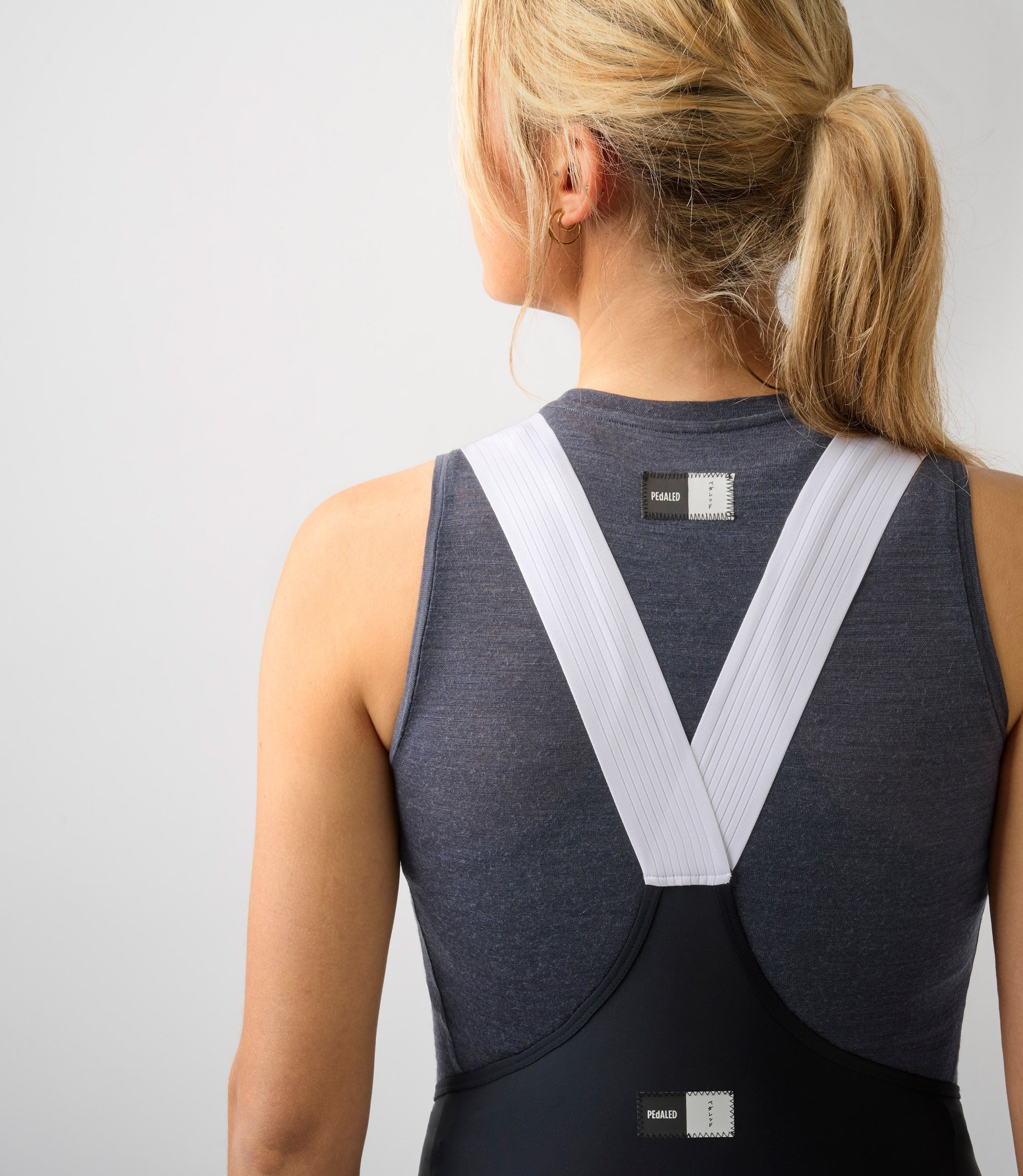 W3SBLEM74PE_6_merino women cycling base layer navy essential back logo pedaled