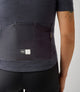 W3SJSEM74PE_8_cycling merino jersey women navy essential back pocket pedaled