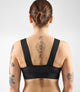 W4SBREL00PE_6_women cycling bra element black back pedaled 1