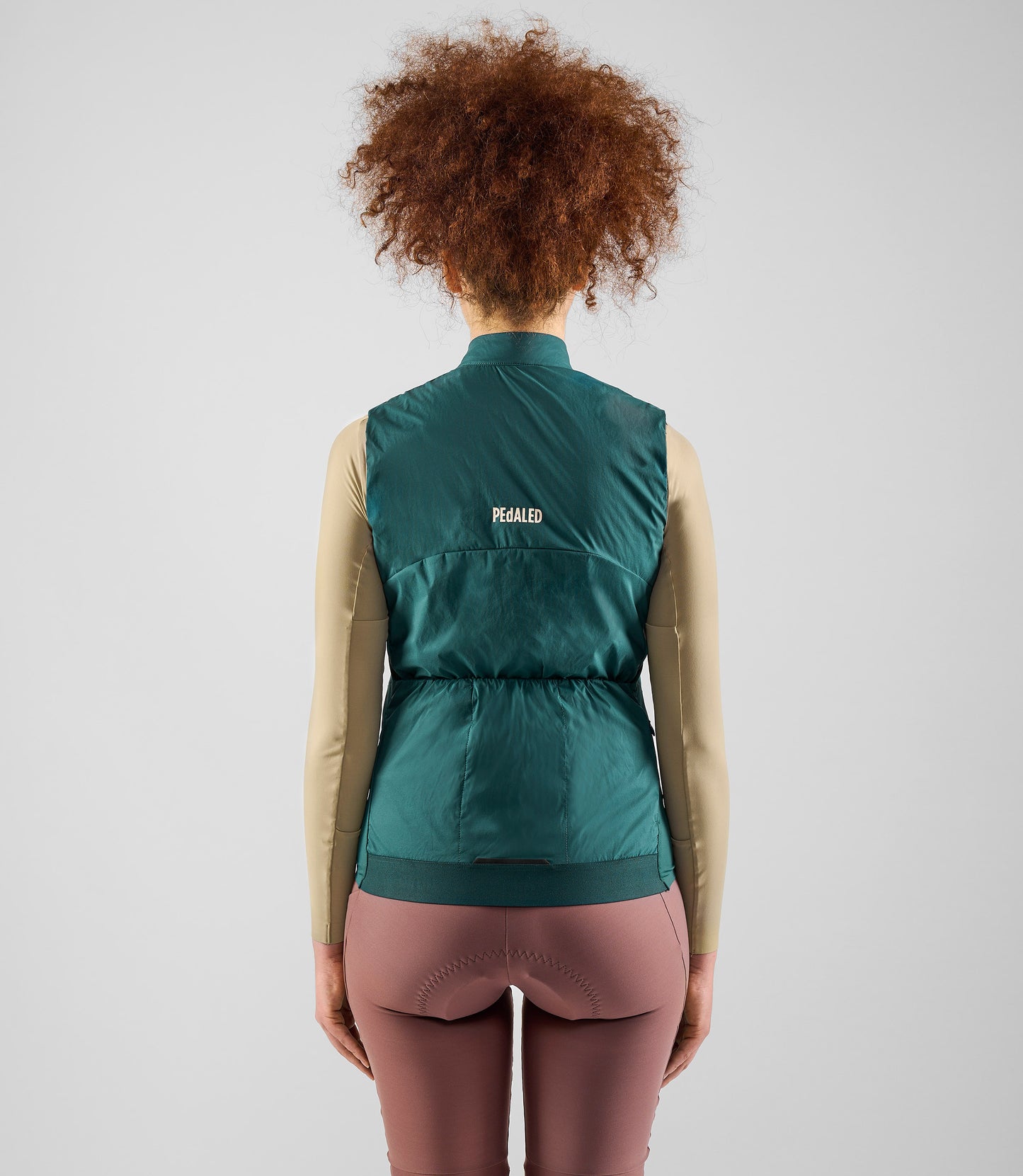 W5WAVEL18PE_4_women cycling vest alpha teal element total body back pedaled