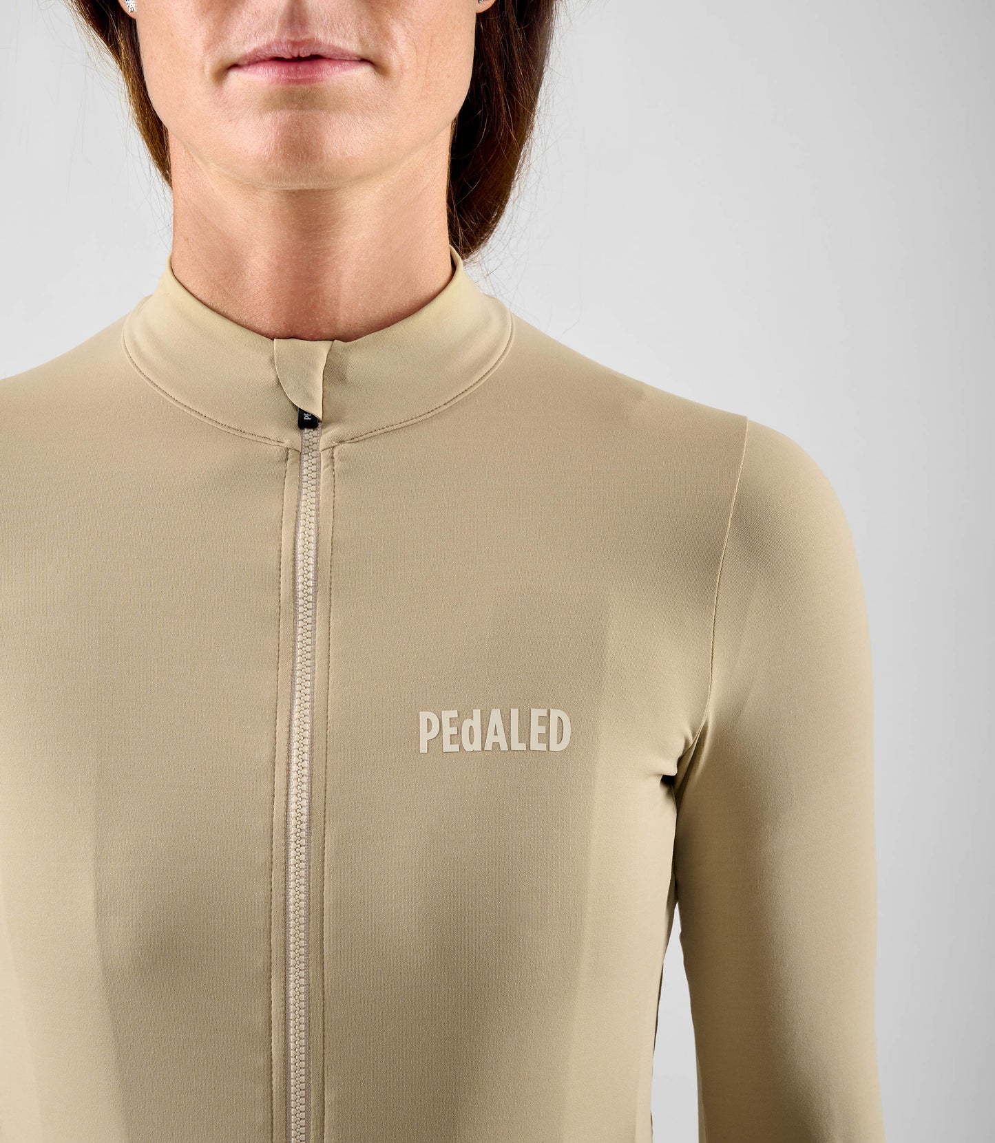 W5WJSEL04PE_5_women cycling jersey long sleeve beige element front pedaled