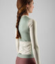 W5WTJEL08PE_7_women cycling training jersey long sleeve light blue element back pedaled
