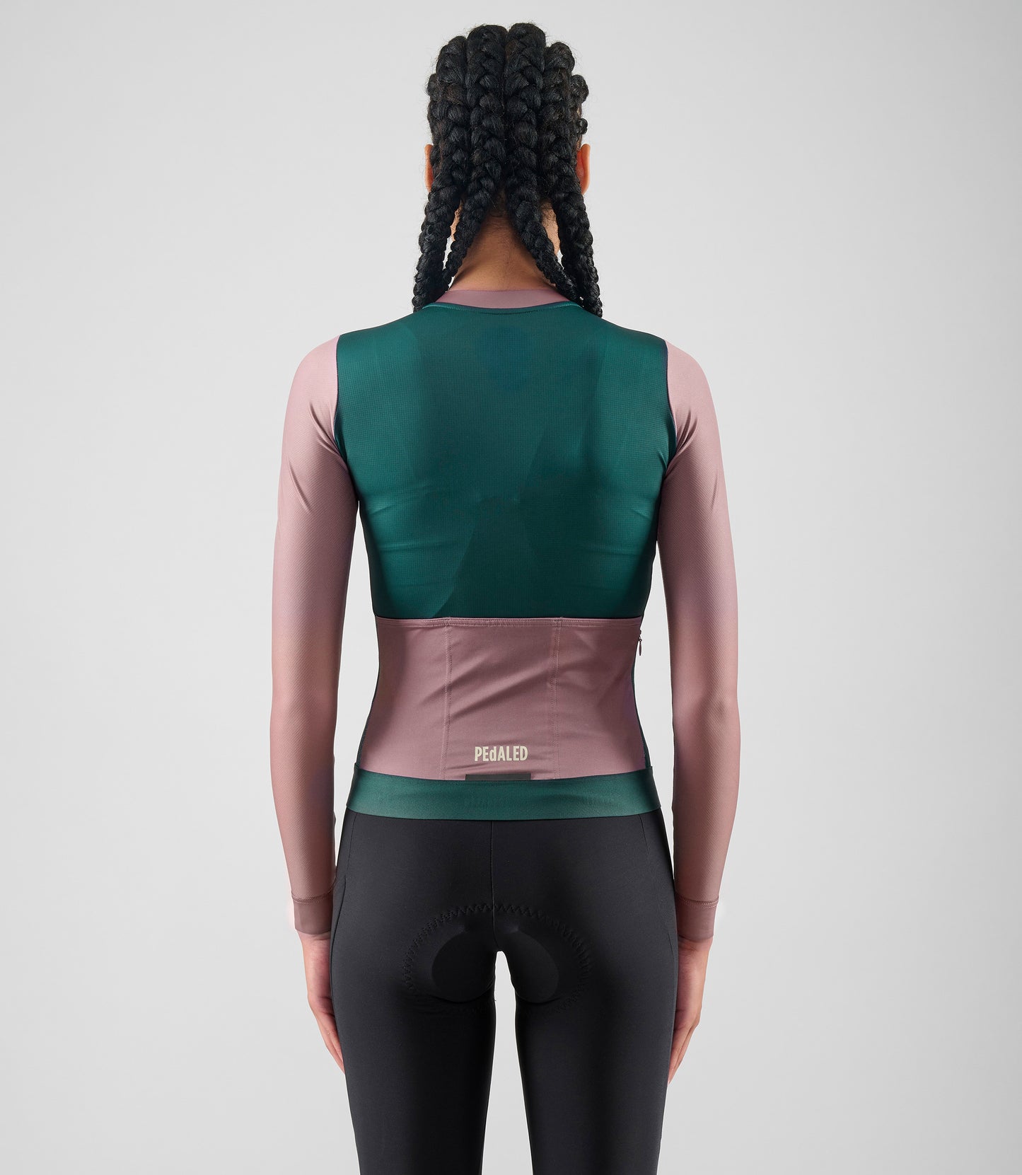 W5WTJEL18PE_4_women cycling training jersey long sleeve teal element total body back pedaled
