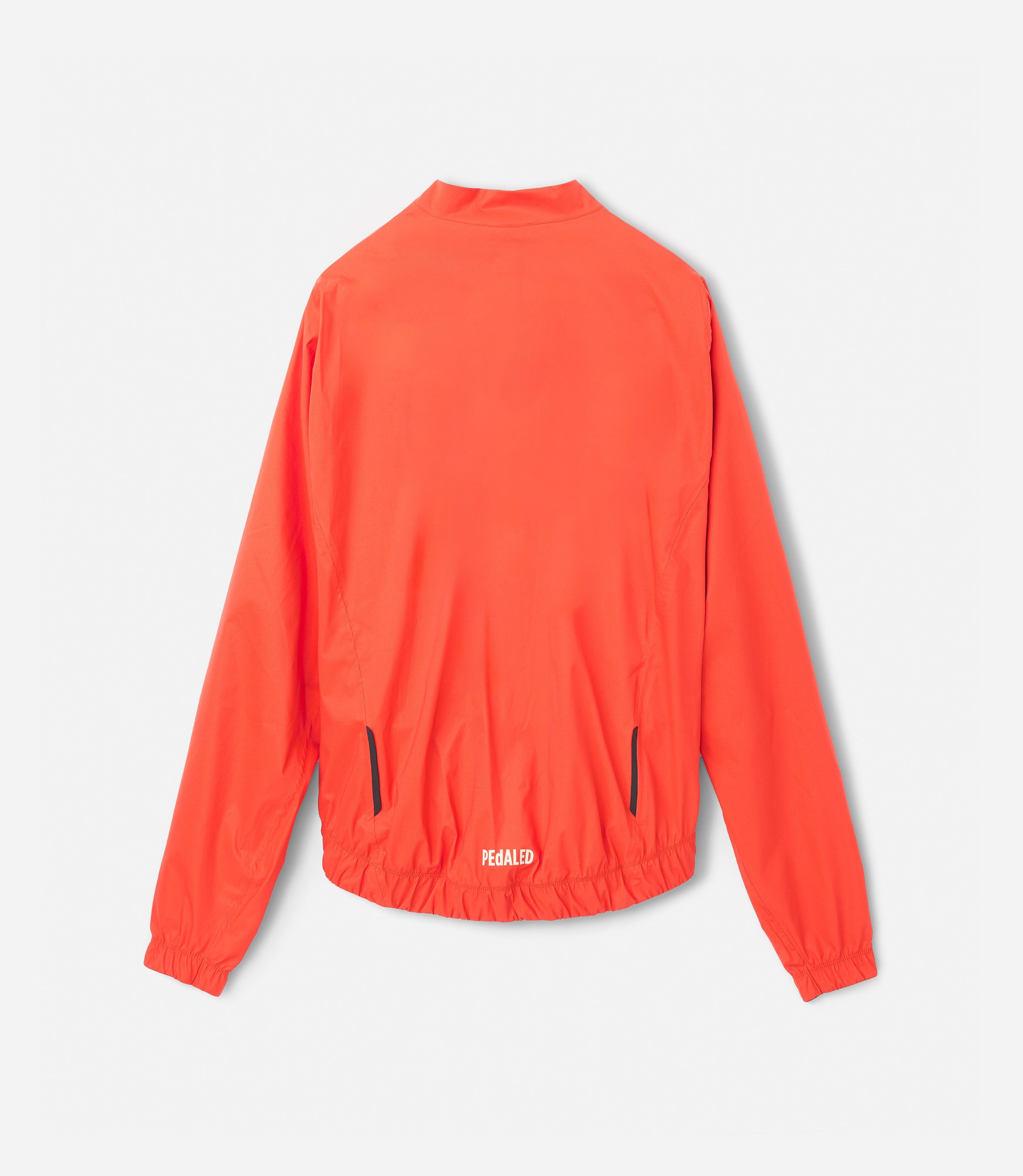 W5WWJEL12PE_2_women cycling jacket waterproof orange element back pedaled