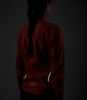 W5WWJEL12PE_9_women cycling waterproof jacket orange element side back reflective pedaled