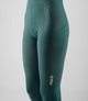 W5WWTEL18PE_5_women cycling bibtight teal element side logo pedaled